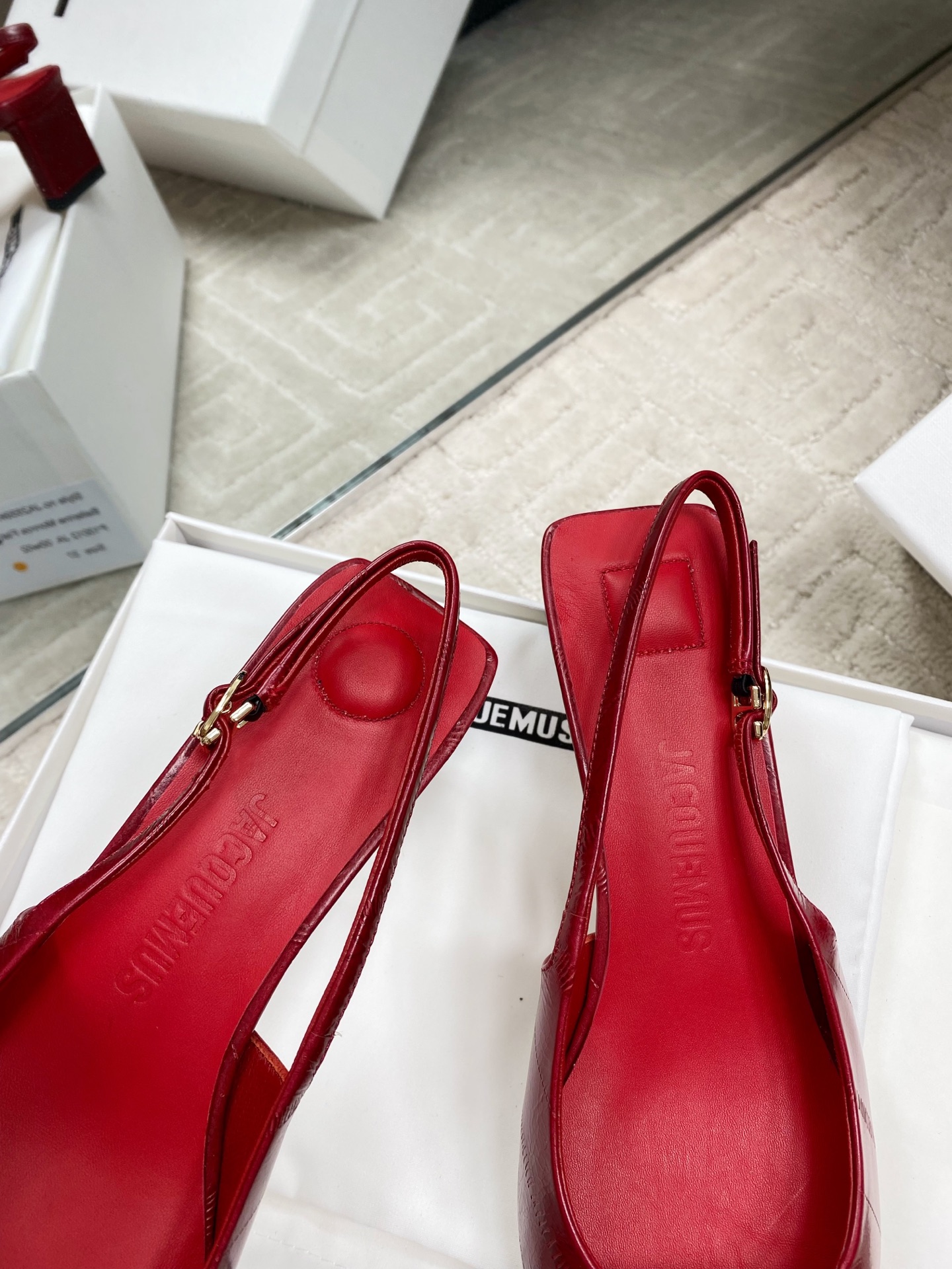 Jacquemus Red Leather Slingback Heels with Asymmetric Buckle Detail 7 i1744813749757 8967 0 5