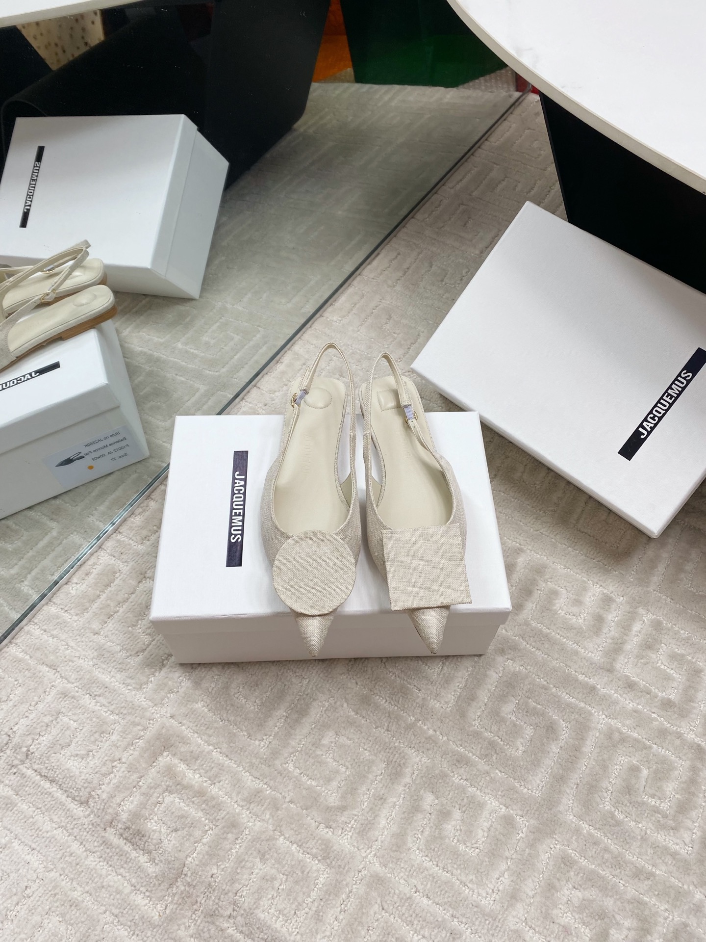 Jacquemus Women's Asymmetric Buckle Slingback Leather Pointed Toe Pumps 1 Jacquemus Women's Asymmetric Buckle Slingback Leather Pointed Toe Pumps