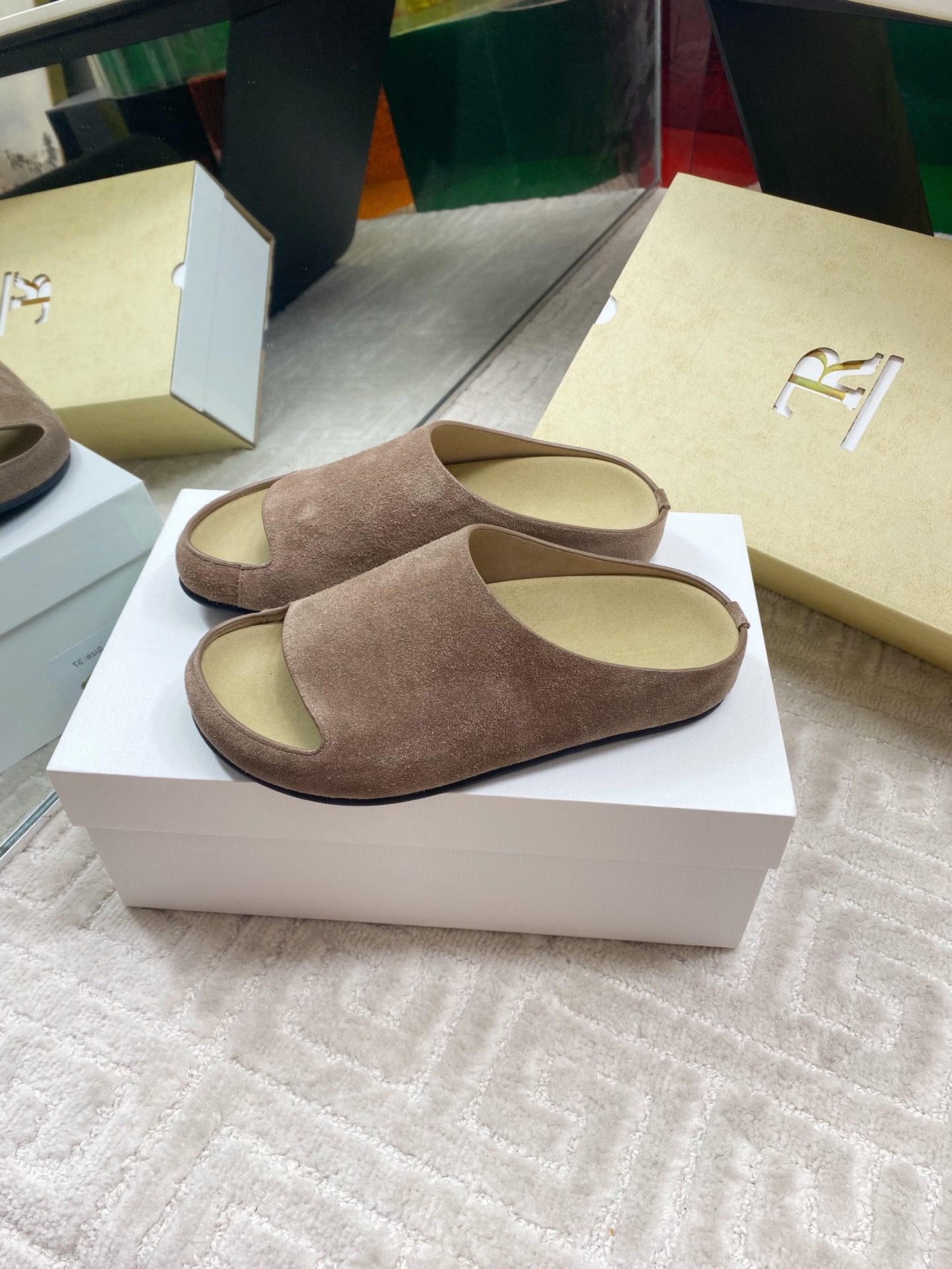 The Row Women's Minimalist Suede Slide Sandals - Round Toe, Comfortable 1 The Row Women's Minimalist Suede Slide Sandals - Round Toe, Comfortable