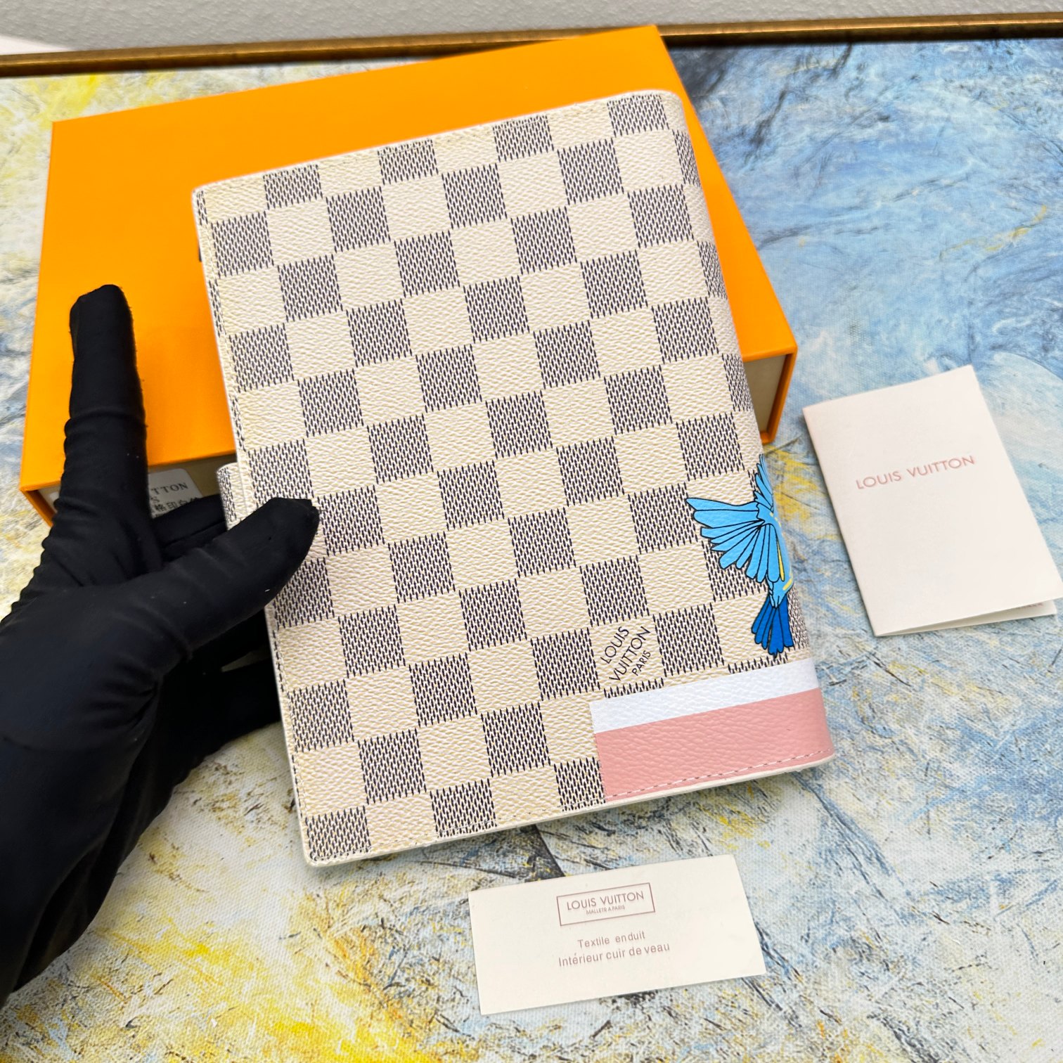 Leather notebook open showing paper
