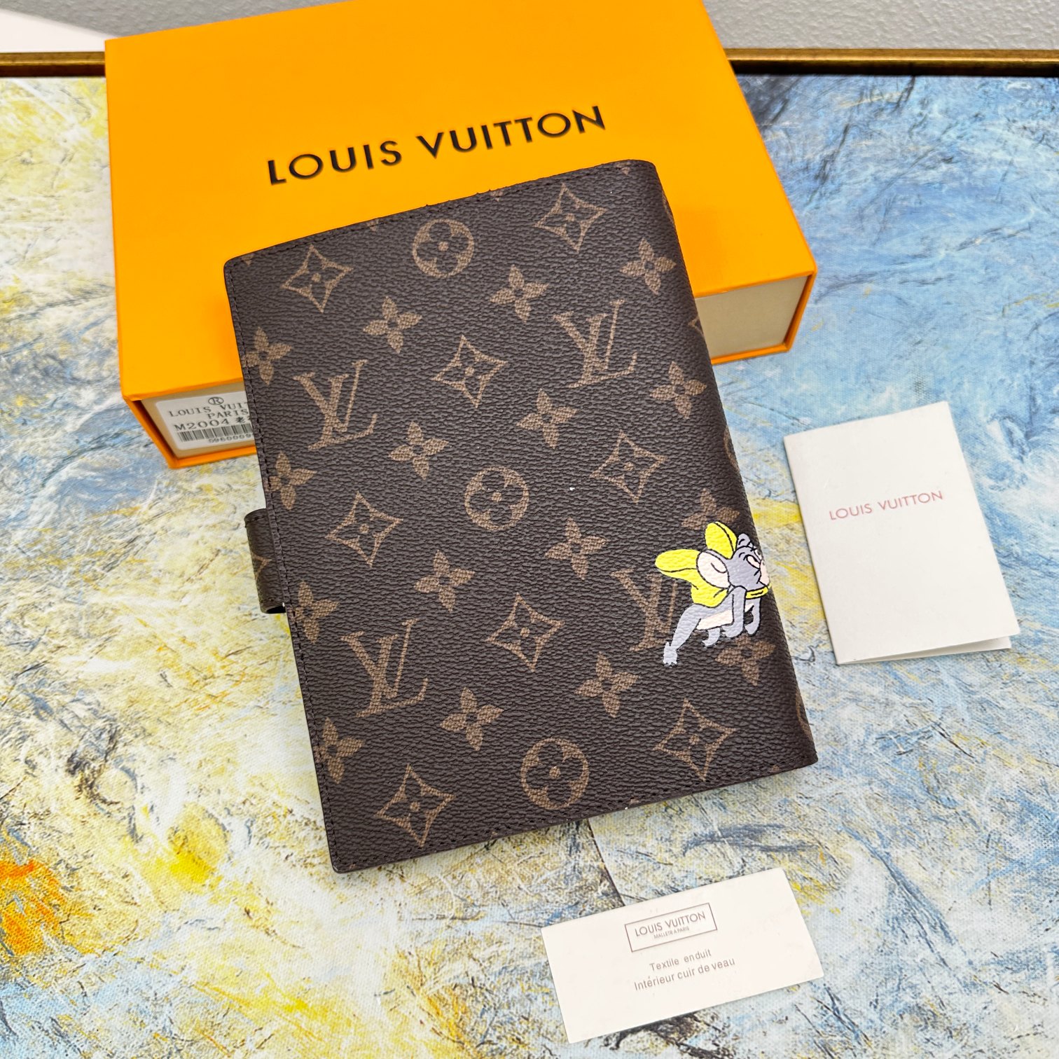 Open view of a small leather notebook