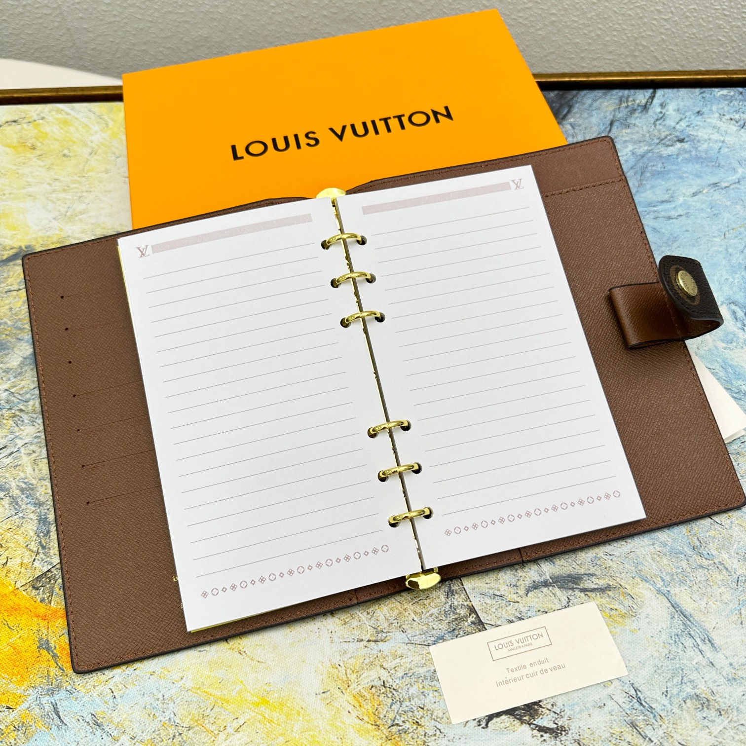 Branding details on small notebook