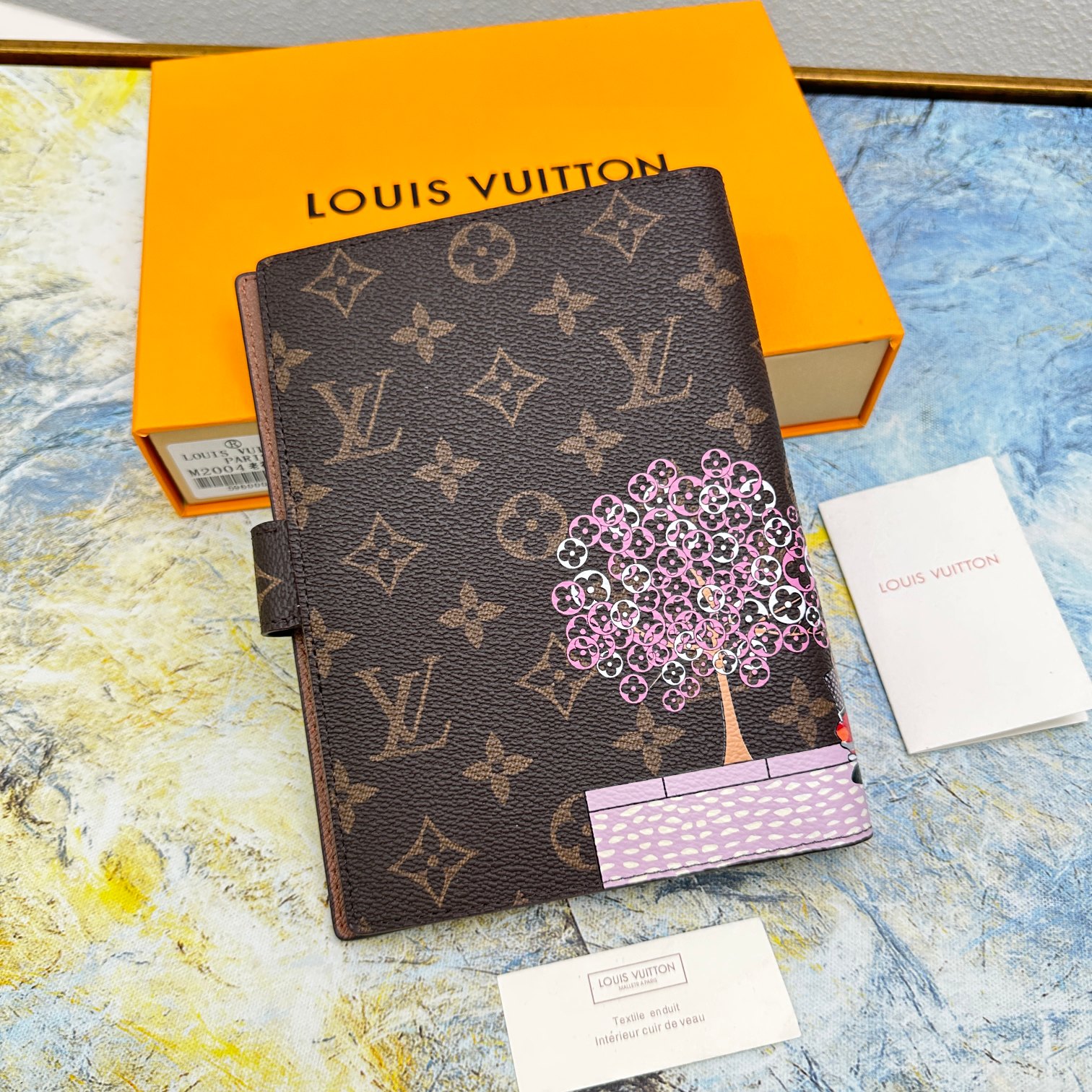 Close-up of the open pages of a small leather notebook