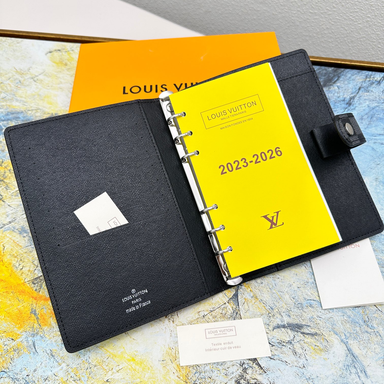 Person using A5 notebook