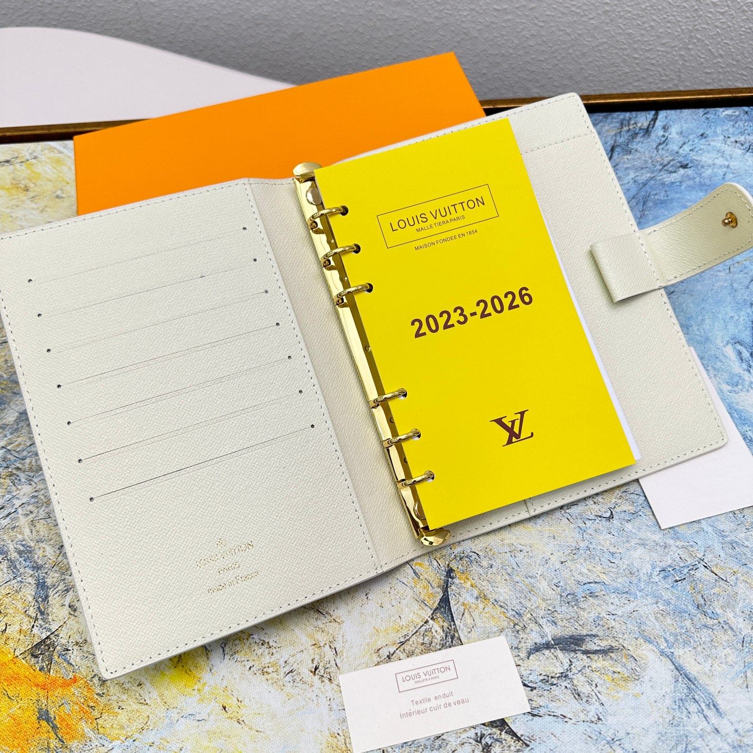 Person using A5 notebook