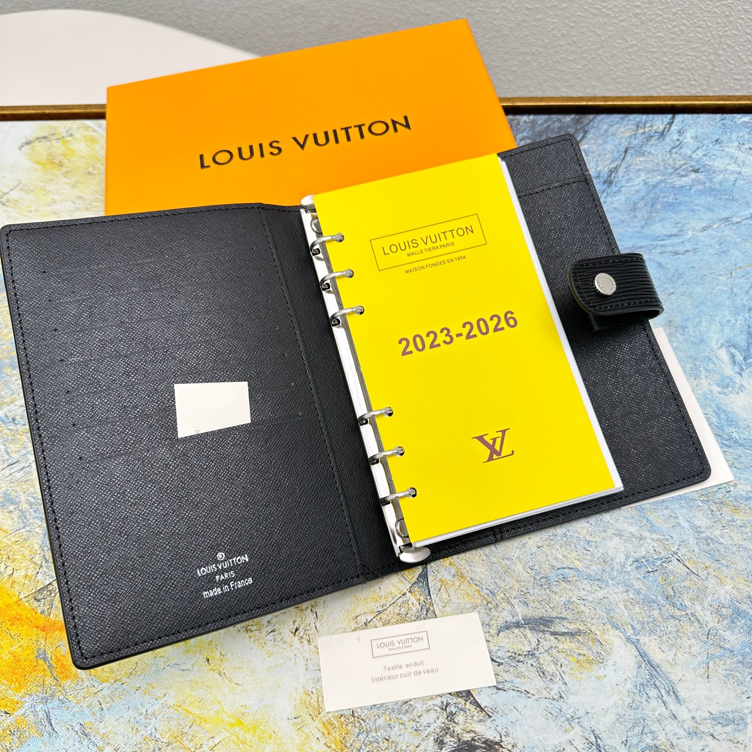 Person using A5 notebook