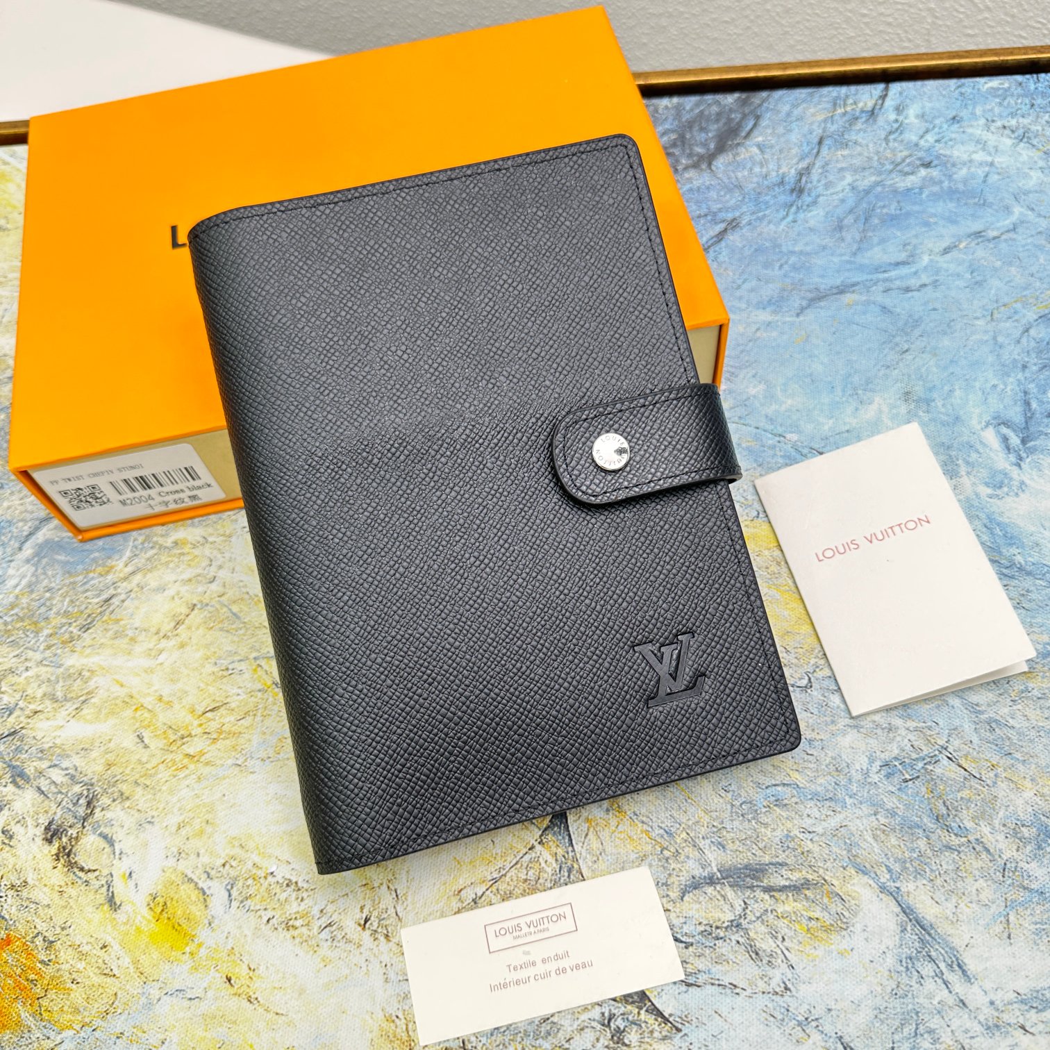 Close-up of the notebook cover, showcasing texture and design.