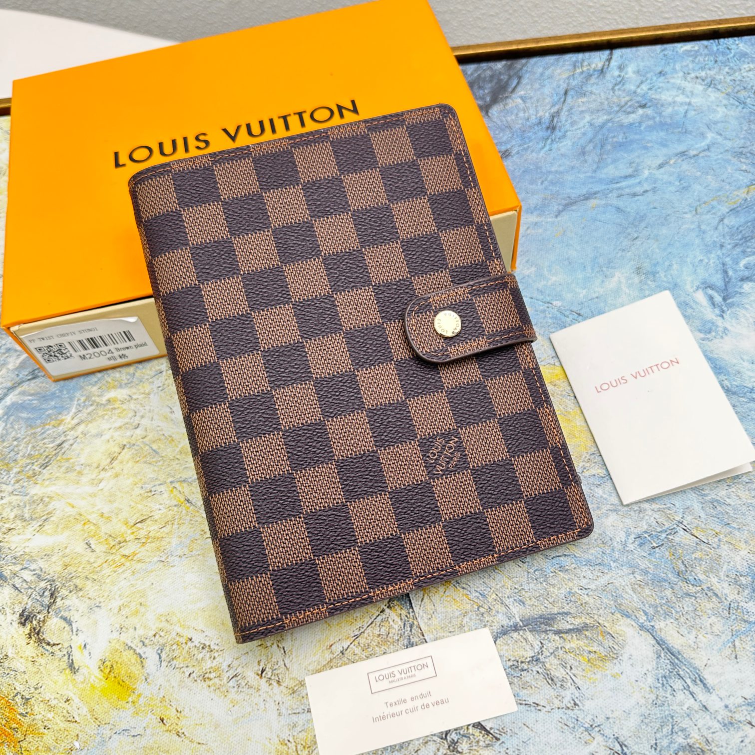 Close-up of the notebook cover, showcasing texture and design.