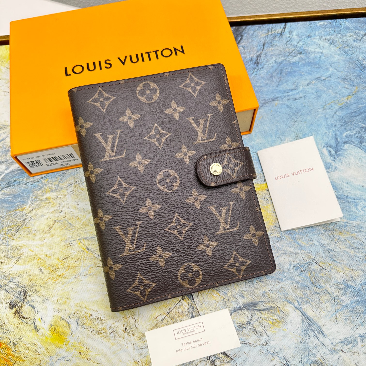 Close-up of the notebook cover, showcasing texture and design.