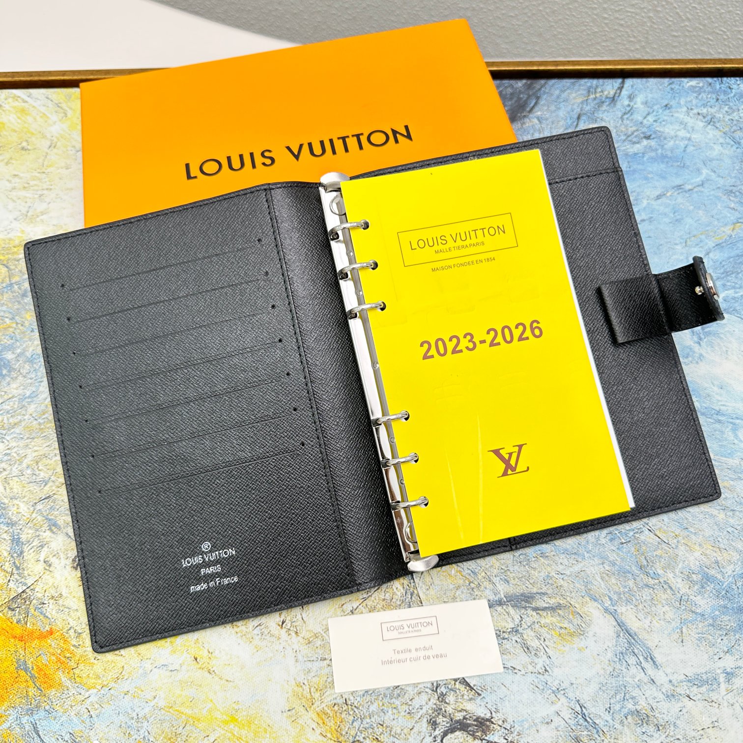 Notebook with accessories.