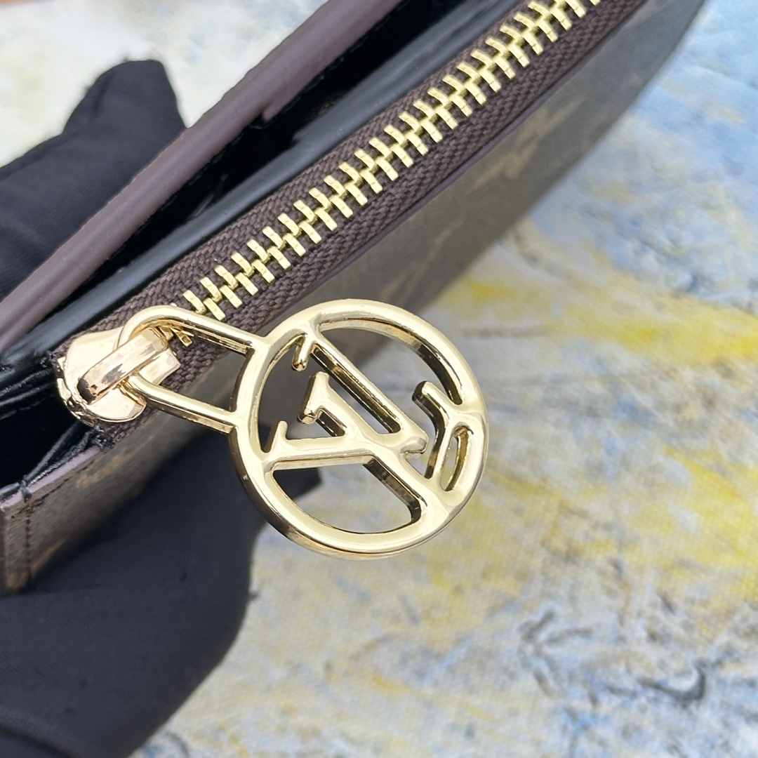 Leather wallet open, displaying the cash compartment.