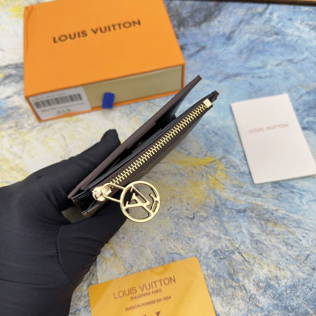 Leather wallet with cards inside.