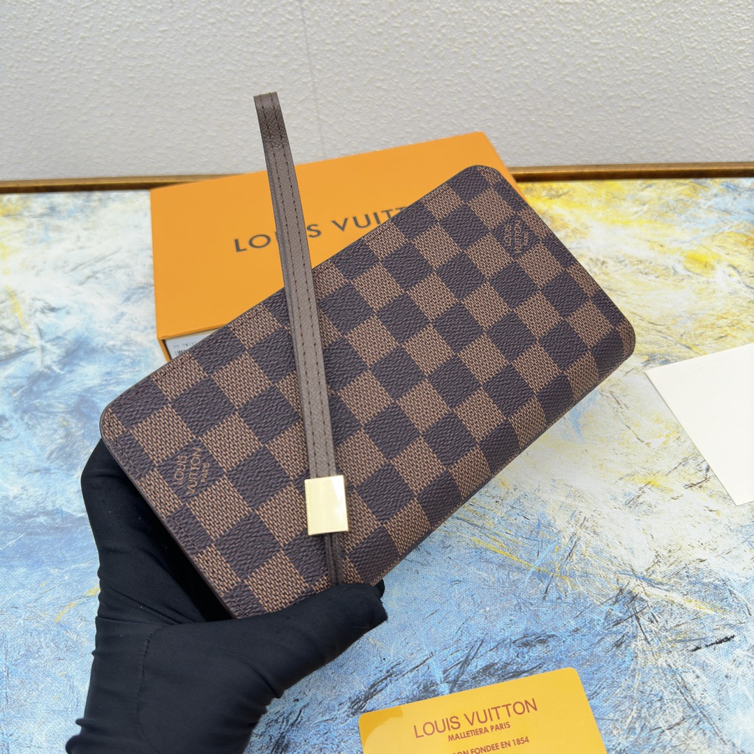 Open view of the leather long zipper wallet showing interior compartments