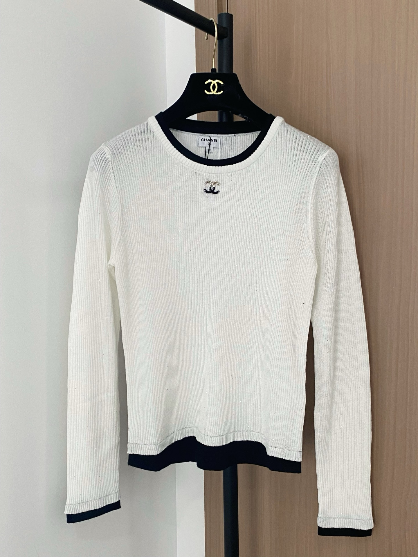 Chanel Women's White Long Sleeve Top with Black Trim and Logo Accent 2 i1756358312189 4192 0 0