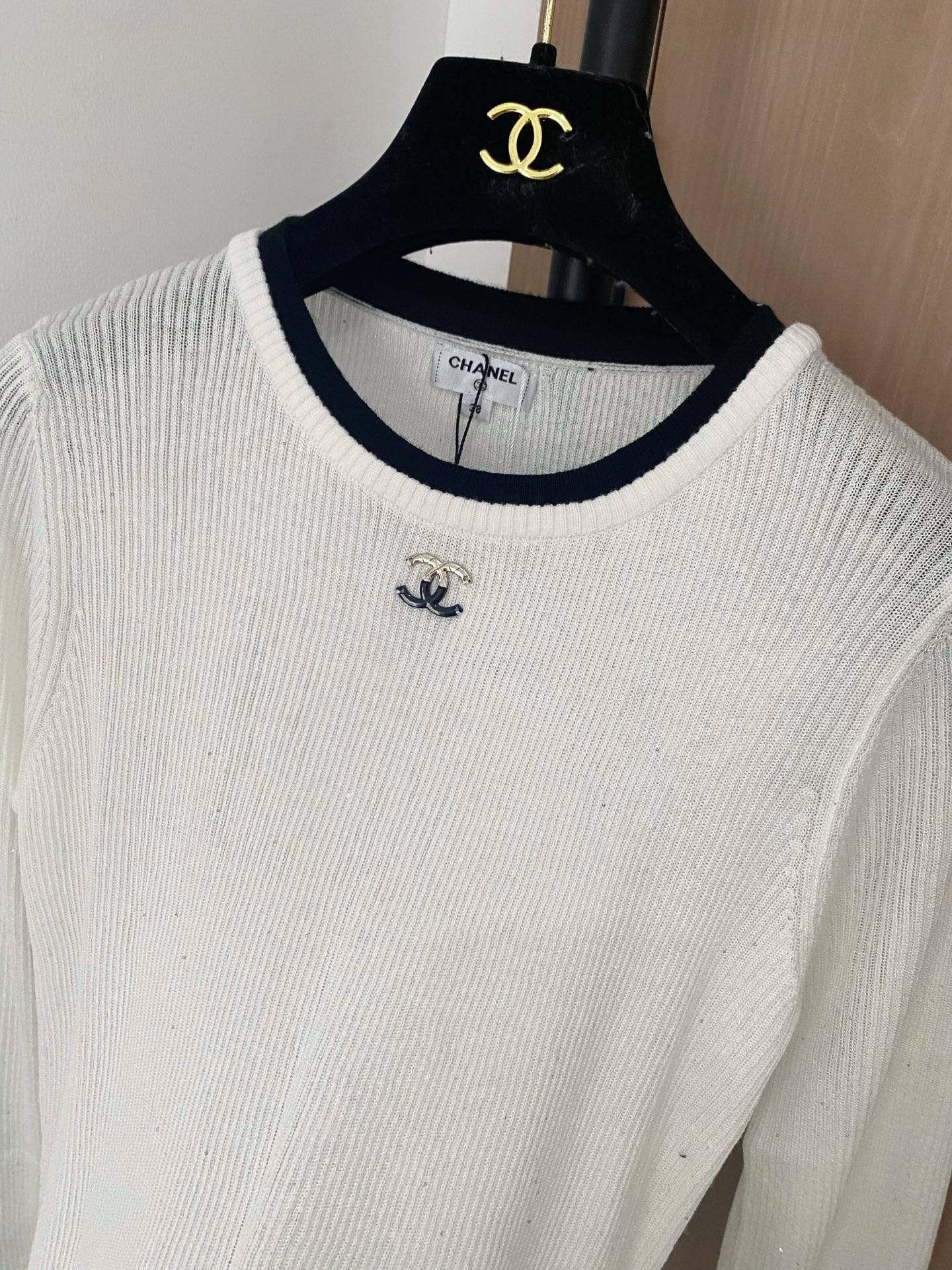Chanel Women's White Long Sleeve Top with Black Trim and Logo Accent 6 i1756358313107 6143 0 4