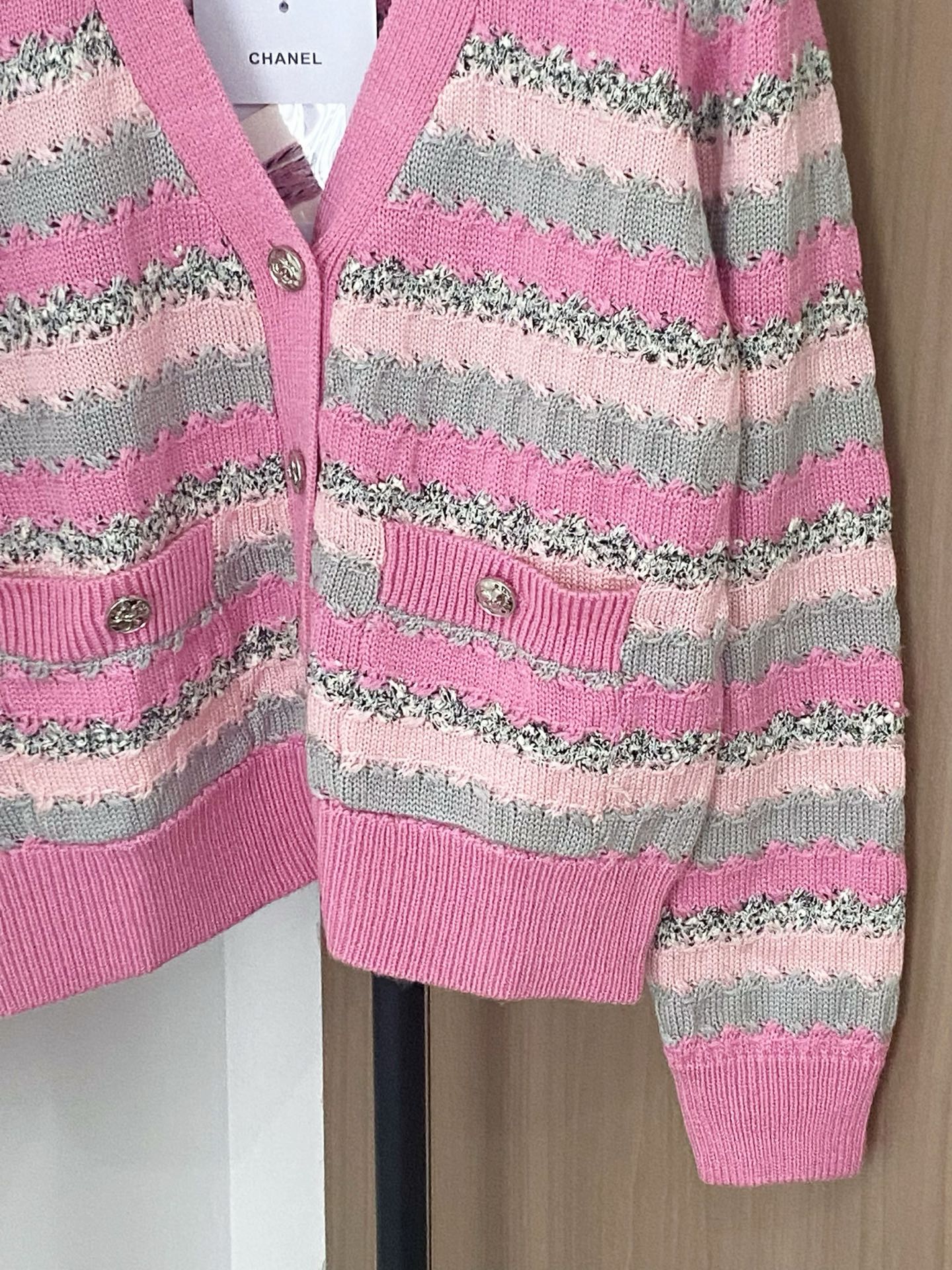 Elegant Chanel Striped Knit Cardigan with V-Neck and Logo Details 5 i1756359500257 952 0 3