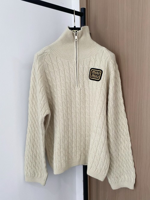 Miu Miu Cable-Knit Wool-Blend Sweater with Logo Appliqué and Zip Neck 1 Miu Miu Cable-Knit Wool-Blend Sweater with Logo Appliqué and Zip Neck