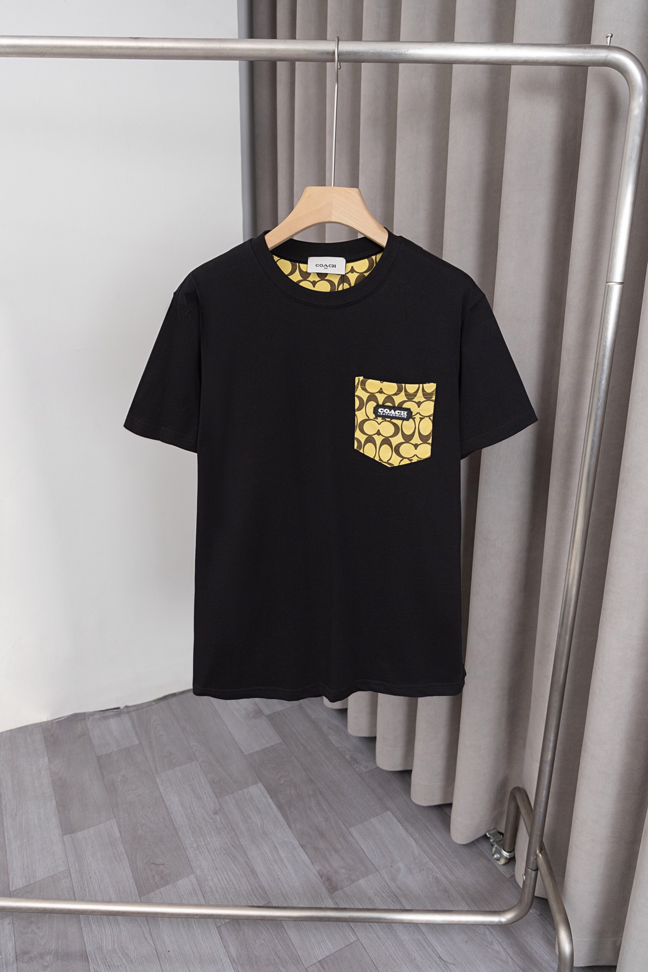 Customized Coach T-shirts with Pocket Design and Soft Fabric in Monochrome.