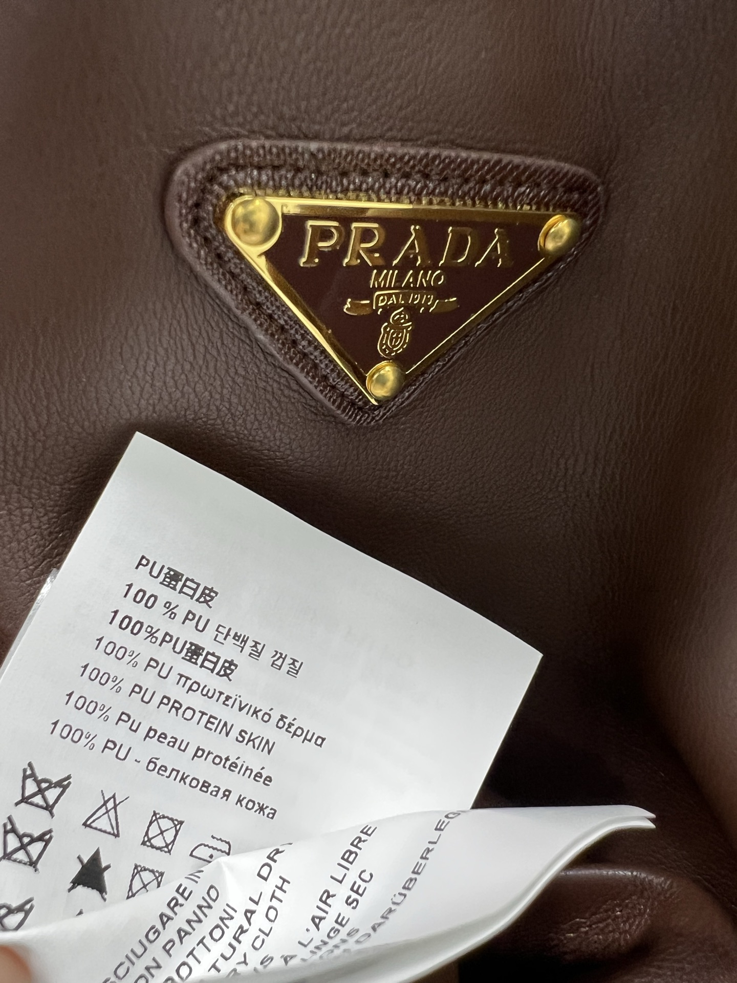 🔥🔥PRAD*25秋冬新款洗水皮皮衣外套 挺括有型 设计独特有质感 翻领拉链外套 搭配弹力下摆 经典夹克