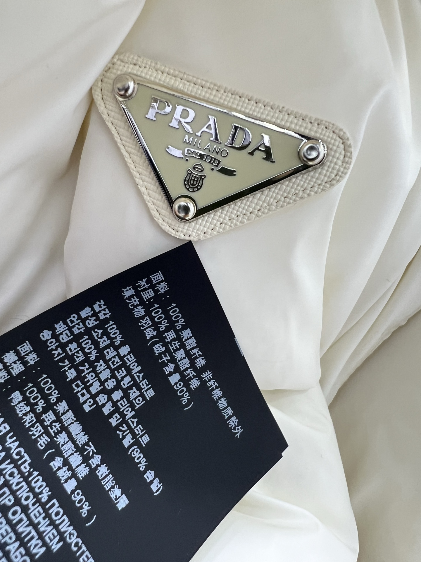 🔥🔥prad*25新款袖子可拆卸羽绒服 经典三角logo皮标牌装饰 连帽面包羽绒服外套 经典宽松廓形版型