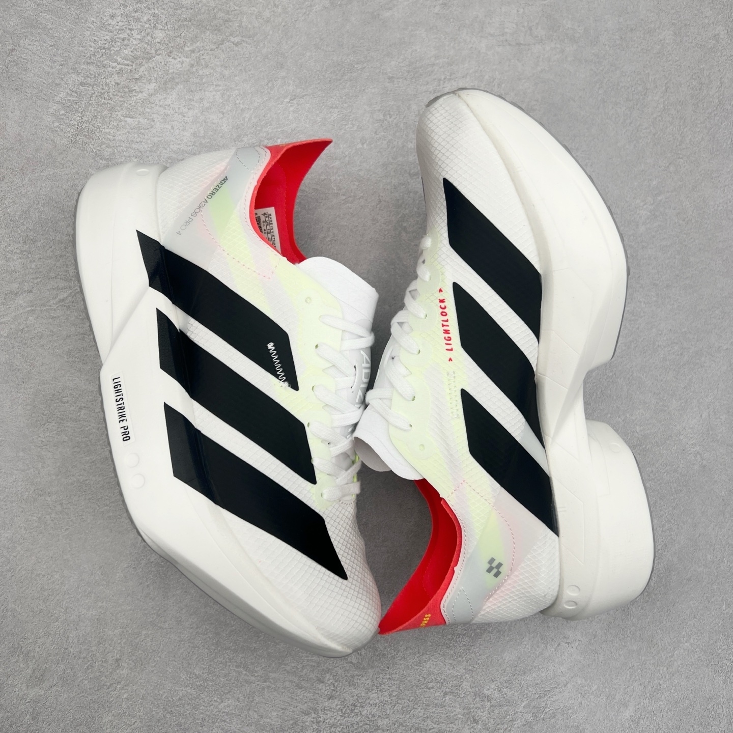 图片[3]-AD Adizero Adios Pro 4 马拉松竞速专业跑鞋 JR1094 CELERMESH针织网面非常轻薄 纤维间的缝隙很大 可以保证跑步时的透气、排汗效果 鞋舌直接与两侧的内衬和鞋底连接在一起 在跑步过程中不会被鞋舌的左右移动所困扰 在标准鞋带孔的基础上再拓宽一组鞋带孔 适合不同脚型的需求 突破性 EnergyRods 技术，有助于跑者实现更好的成绩 中底独特的LIGHTSTRIKE PRO泡棉材质 微弹感觉在跑步过程中给予了良好的支撑体验 对于顶级精英和高水平进阶跑者来说 ADIOS PRO是一双值得信赖的竞速比赛用鞋 尺码：36 36.5 37.5 38 38.5 39 40 40.5 41 42 42.5 43 44 44.5 45-选品中心