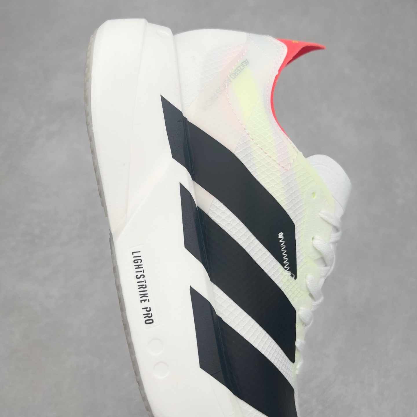 图片[6]-AD Adizero Adios Pro 4 马拉松竞速专业跑鞋 JR1094 CELERMESH针织网面非常轻薄 纤维间的缝隙很大 可以保证跑步时的透气、排汗效果 鞋舌直接与两侧的内衬和鞋底连接在一起 在跑步过程中不会被鞋舌的左右移动所困扰 在标准鞋带孔的基础上再拓宽一组鞋带孔 适合不同脚型的需求 突破性 EnergyRods 技术，有助于跑者实现更好的成绩 中底独特的LIGHTSTRIKE PRO泡棉材质 微弹感觉在跑步过程中给予了良好的支撑体验 对于顶级精英和高水平进阶跑者来说 ADIOS PRO是一双值得信赖的竞速比赛用鞋 尺码：36 36.5 37.5 38 38.5 39 40 40.5 41 42 42.5 43 44 44.5 45-选品中心