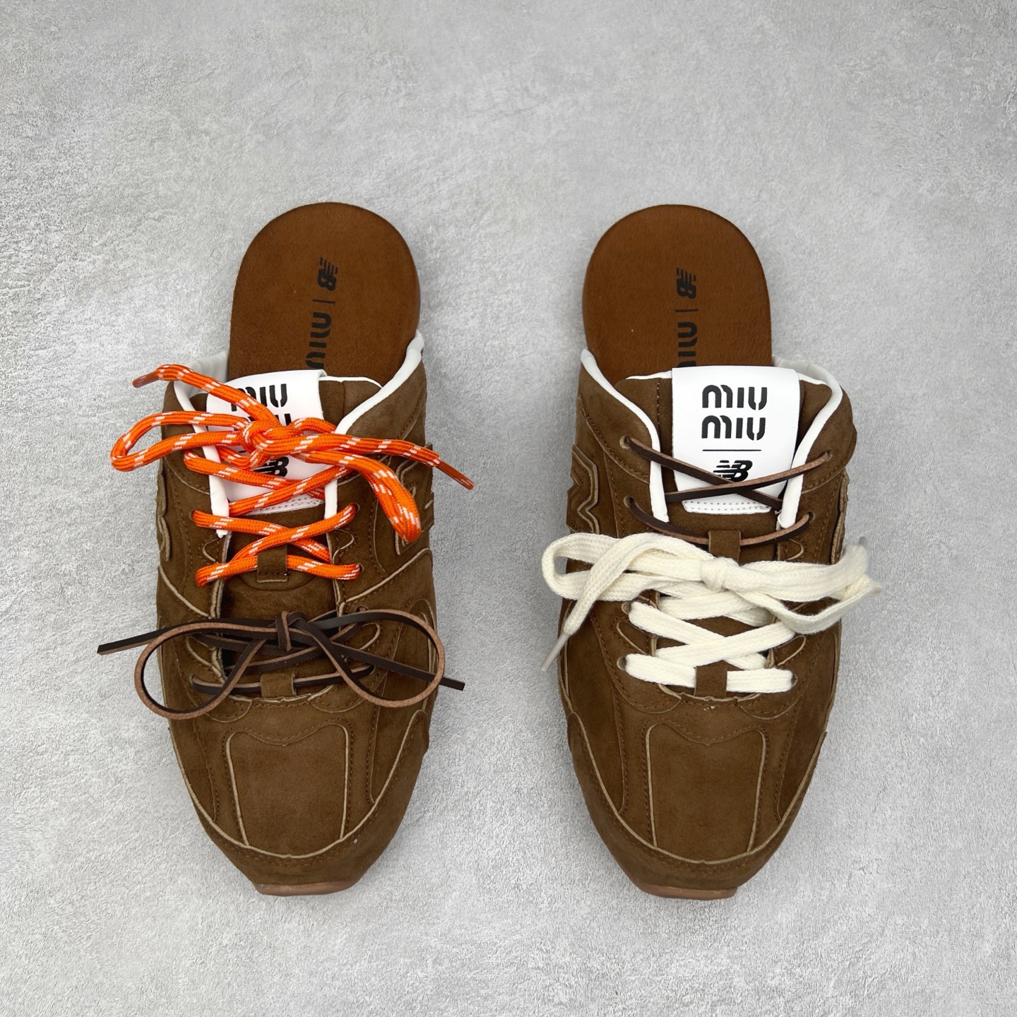 图片[2]-MiuMiu x New Balance NB530 SL 缪缪联名系列低帮经典复古休闲运动鞋半拖 近几年运动品牌与各大潮流品牌不断推出联名产品，在球鞋圈拥有极高的热度。此外，奢侈品牌和运动品牌联名也早已非新鲜事，继 Dior 和 Jordan Brand 以及 Prada 和 adidas 合作后。近日，Miu Miu与New Balance的合作基本已经成为定番，每年都会上新，而近期的最新联名也已经正式曝光，预计会在24年春夏面世！相比之前两次使用的574，这次Miu Miu带来了全新风格。采用了全新型号MR530进行设计，继续使用复古的旧化效果和去年就被带火的美拉德配色打造。Miu Miu作为千禧文化的重要推手，这次也是直接挑选了New Balance 2000年代时发布的健身跑鞋MR530。整体做旧效果非常明显，甚至有些二手鞋的感觉，多少是有点瘦巴黎世家影响了……配色方面将会推出米色和棕色两种颜色可供选择，整体覆盖了做旧麂皮，鞋舌和鞋垫和之前一致，有Miu Miu的Logo，同时搭配皮革和棉质双鞋带组成。尺码：36 37 37.5 38 38.5 39.5 40 40.5 41.5 42 42.5 43.5 44 44.5 45-选品中心