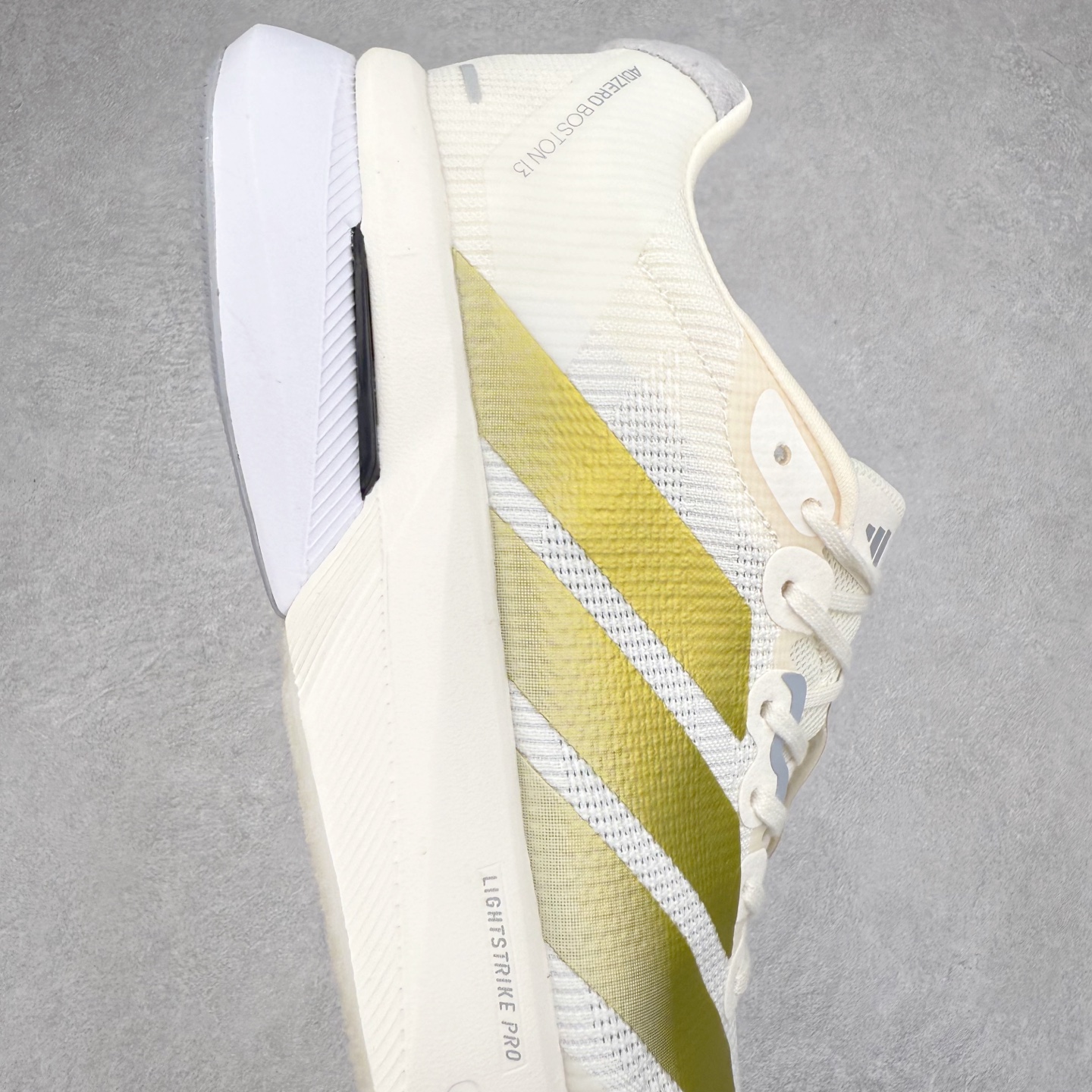 图片[6]-AD Adizero Boston 13 夏季透气网眼竞速跑鞋 JS4947 融合Lightstrike和Lightstrike Pro技术 采用乙烯/乙酸乙烯酯(EVA)材质 打造舒适中底 含ENERGYROD能量碳柱 旨在为步伐添活力 尺码：36 36.5 37 38 38.5 39 40 40.5 41 42 42.5 43 44 44.5 45-选品中心