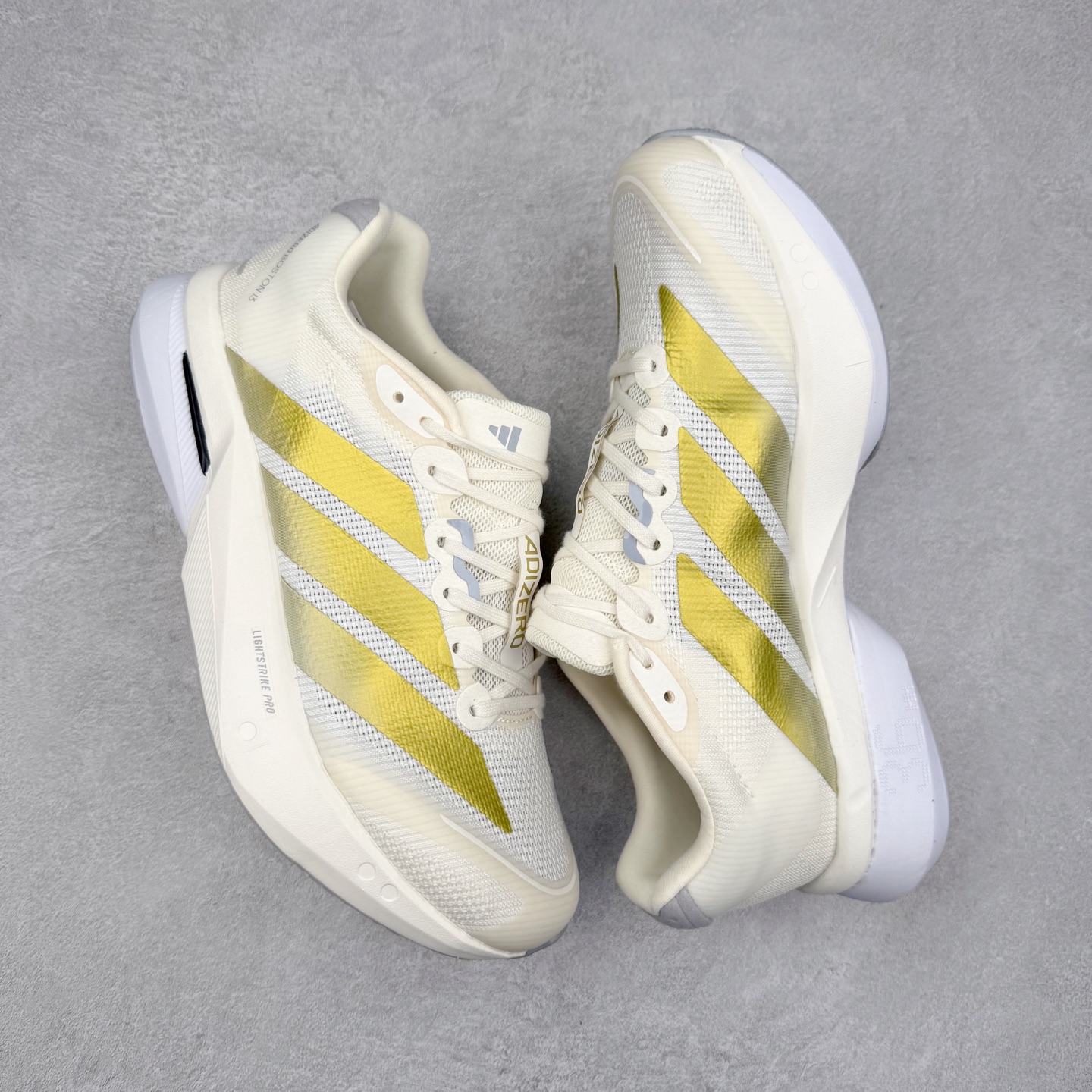 图片[3]-AD Adizero Boston 13 夏季透气网眼竞速跑鞋 JS4947 融合Lightstrike和Lightstrike Pro技术 采用乙烯/乙酸乙烯酯(EVA)材质 打造舒适中底 含ENERGYROD能量碳柱 旨在为步伐添活力 尺码：36 36.5 37 38 38.5 39 40 40.5 41 42 42.5 43 44 44.5 45-选品中心