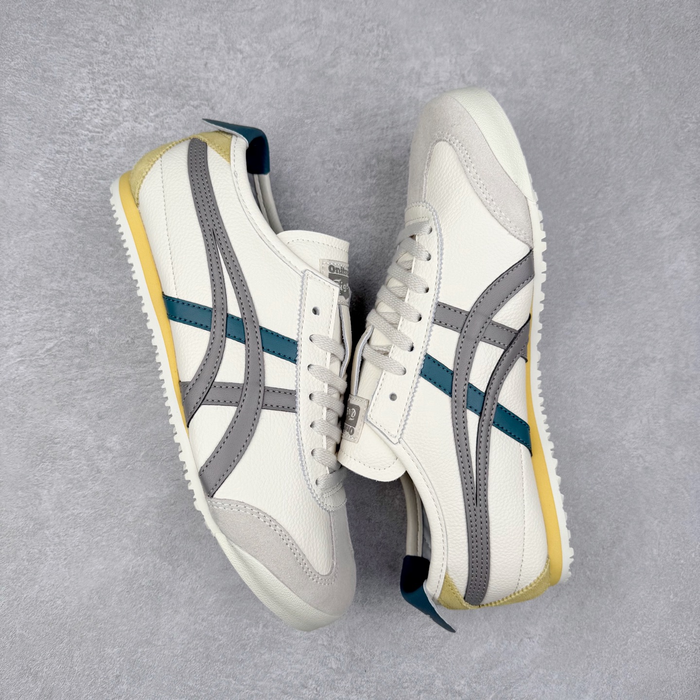 图片[3]-Asics Onitsuka Tiger MEXICO 66 亚瑟士鬼冢虎复古经典板鞋 市场王者选手 海外订单工厂出品 长期生产补货永不断码 超成熟稳定的做工品控 原装全套纸板楦头开发 原汁原味 完美呈现版型 私模正确鞋底咬花纹路 一比一鞋头弧度高度鞋身弧度 绝不口嗨 细节品控鞋型随意秒杀市面 原档咬花纹路私模大底 一个单元有六个三角形 总体形拼接呈现花瓣状 官方四联吊牌 原装Ortholite轻量化鞋垫 原盒原配 质保卡 说明书 钢印防尘纸 纸板中底带钢印 乳胶组合鞋垫 支持全方位的对比专柜 产品从款式颜色造型上体现出追求舒适和细节的完美 鞋类更是推崇手工制作的严谨与完美 融舒适性与可穿性的设计风格 注重细节的完美和别致魅力 既保持稳重 又不失轻松的时尚感 尺码：36 37 37.5 38 39 39.5 40 40.5 41.5 42 42.5 43.5 44 45-选品中心
