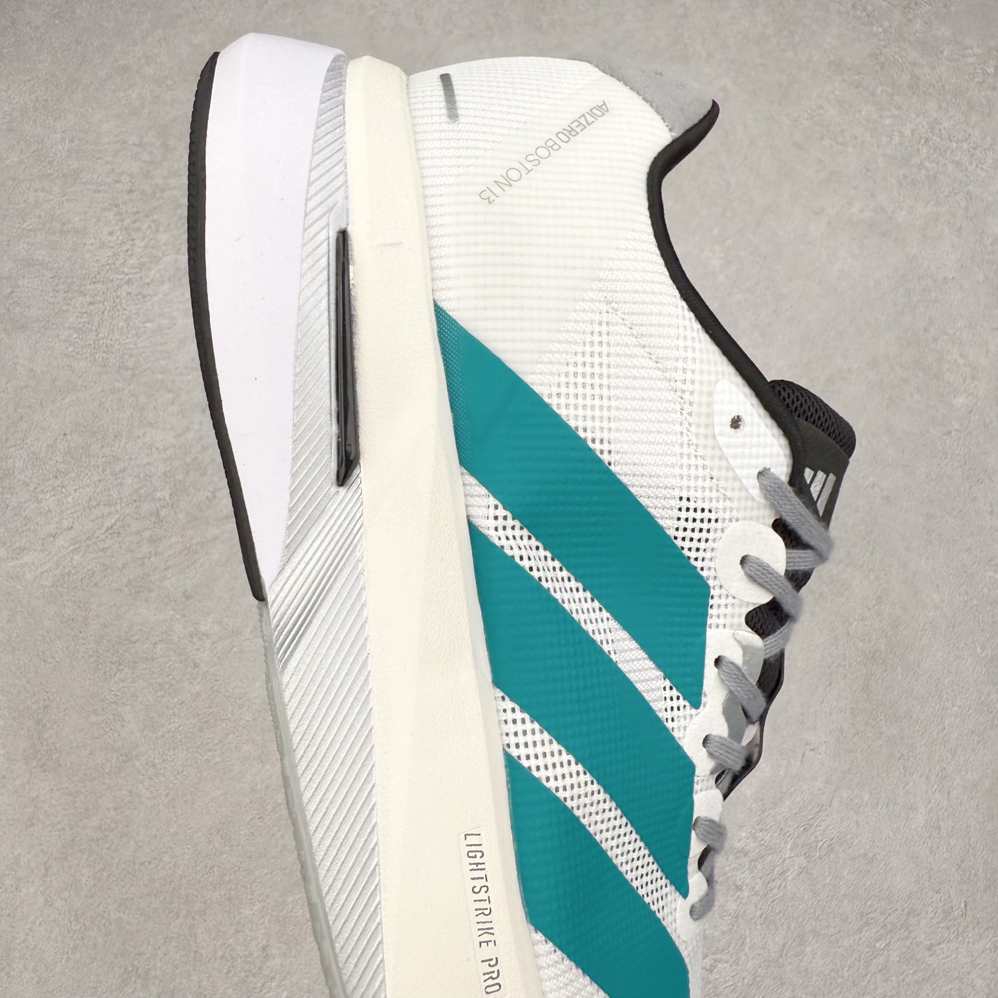 图片[6]-AD Adizero Boston 13 夏季透气网眼竞速跑鞋 融合Lightstrike和Lightstrike Pro技术 采用乙烯/乙酸乙烯酯(EVA)材质 打造舒适中底 含ENERGYROD能量碳柱 旨在为步伐添活力 尺码：36 36.5 37 38 38.5 39 40 40.5 41 42 42.5 43 44 44.5 45-选品中心