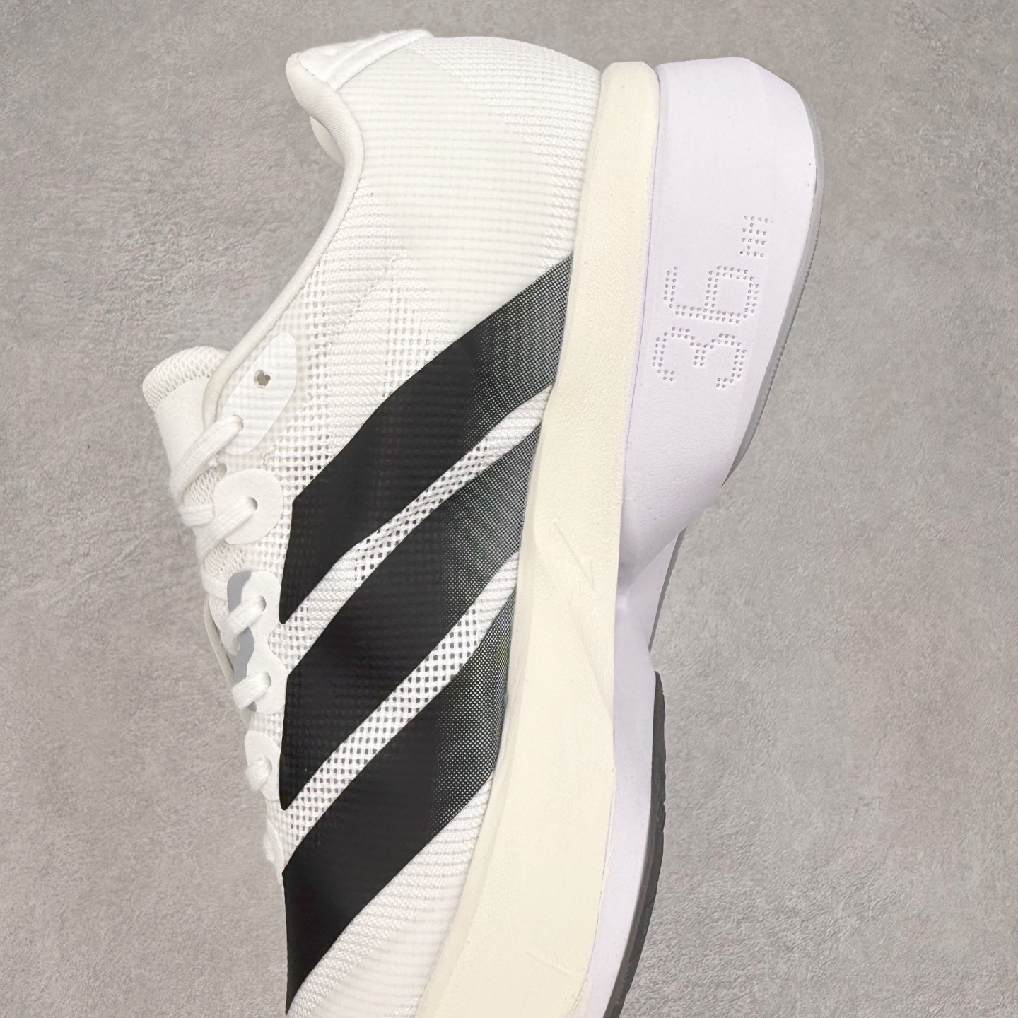 图片[7]-AD Adizero Boston 13 夏季透气网眼竞速跑鞋 融合Lightstrike和Lightstrike Pro技术 采用乙烯/乙酸乙烯酯(EVA)材质 打造舒适中底 含ENERGYROD能量碳柱 旨在为步伐添活力 尺码：36 36.5 37 38 38.5 39 40 40.5 41 42 42.5 43 44 44.5 45-选品中心