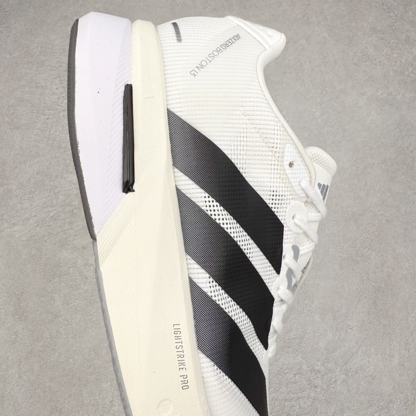 图片[6]-AD Adizero Boston 13 夏季透气网眼竞速跑鞋 融合Lightstrike和Lightstrike Pro技术 采用乙烯/乙酸乙烯酯(EVA)材质 打造舒适中底 含ENERGYROD能量碳柱 旨在为步伐添活力 尺码：36 36.5 37 38 38.5 39 40 40.5 41 42 42.5 43 44 44.5 45-选品中心