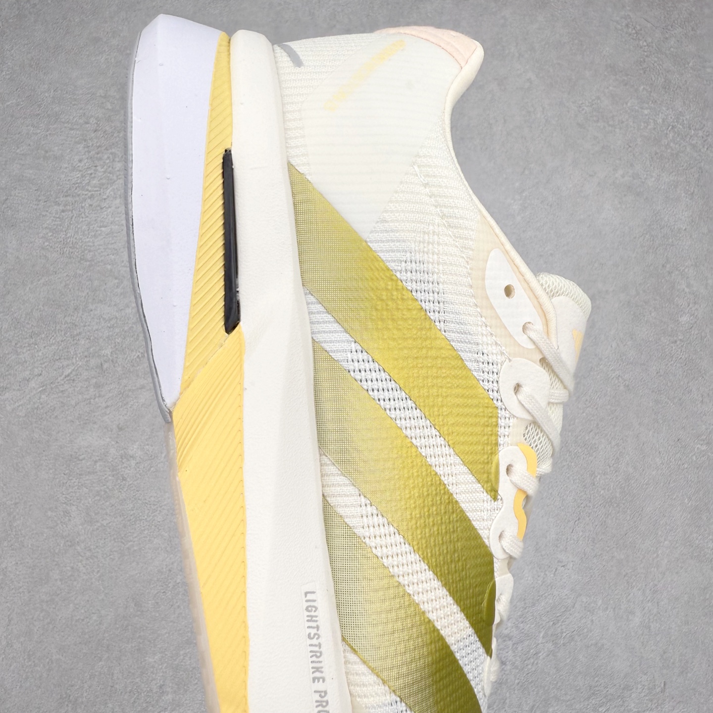 图片[6]-AD Adizero Boston 13 夏季透气网眼竞速跑鞋 JS4952 融合Lightstrike和Lightstrike Pro技术 采用乙烯/乙酸乙烯酯(EVA)材质 打造舒适中底 含ENERGYROD能量碳柱 旨在为步伐添活力 尺码：36 36.5 37 38 38.5 39 40 40.5 41 42 42.5 43 44 44.5 45-选品中心