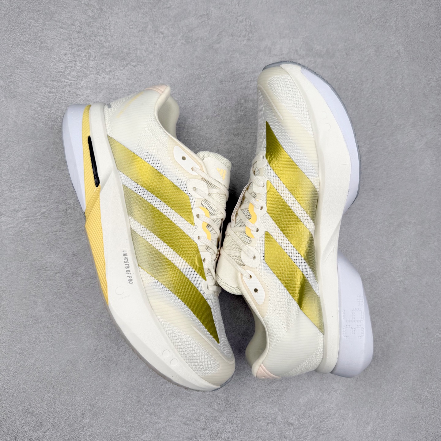 图片[3]-AD Adizero Boston 13 夏季透气网眼竞速跑鞋 JS4952 融合Lightstrike和Lightstrike Pro技术 采用乙烯/乙酸乙烯酯(EVA)材质 打造舒适中底 含ENERGYROD能量碳柱 旨在为步伐添活力 尺码：36 36.5 37 38 38.5 39 40 40.5 41 42 42.5 43 44 44.5 45-选品中心