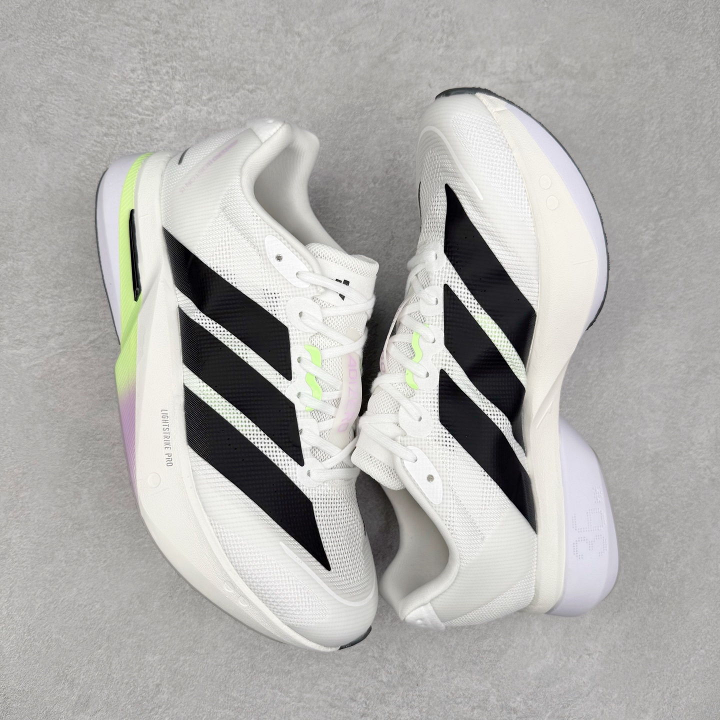 图片[3]-AD Adizero Boston 13 夏季透气网眼竞速跑鞋 JP7149 融合Lightstrike和Lightstrike Pro技术 采用乙烯/乙酸乙烯酯(EVA)材质 打造舒适中底 含ENERGYROD能量碳柱 旨在为步伐添活力 尺码：36 36.5 37 38 38.5 39 40 40.5 41 42 42.5 43 44 44.5 45-选品中心