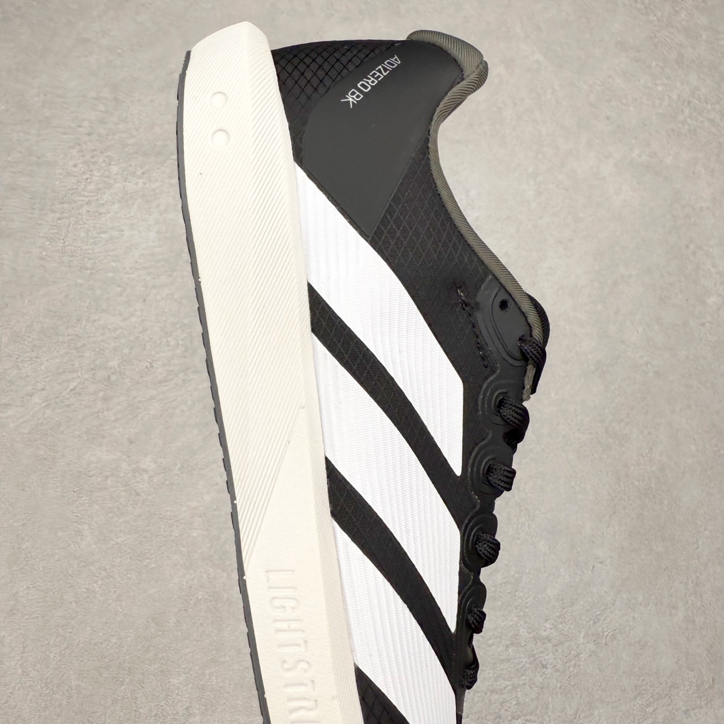 图片[6]-AD Adizero BK 夏季透气网眼竞速跑鞋 JP6528 融合Lightstrike和Lightstrike Pro技术 采用乙烯/乙酸乙烯酯(EVA)材质 打造舒适中底 含ENERGYROD能量碳柱 旨在为步伐添活力 尺码：36 36.5 37 38 38.5 39 40 40.5 41 42 42.5 43 44 44.5 45-选品中心