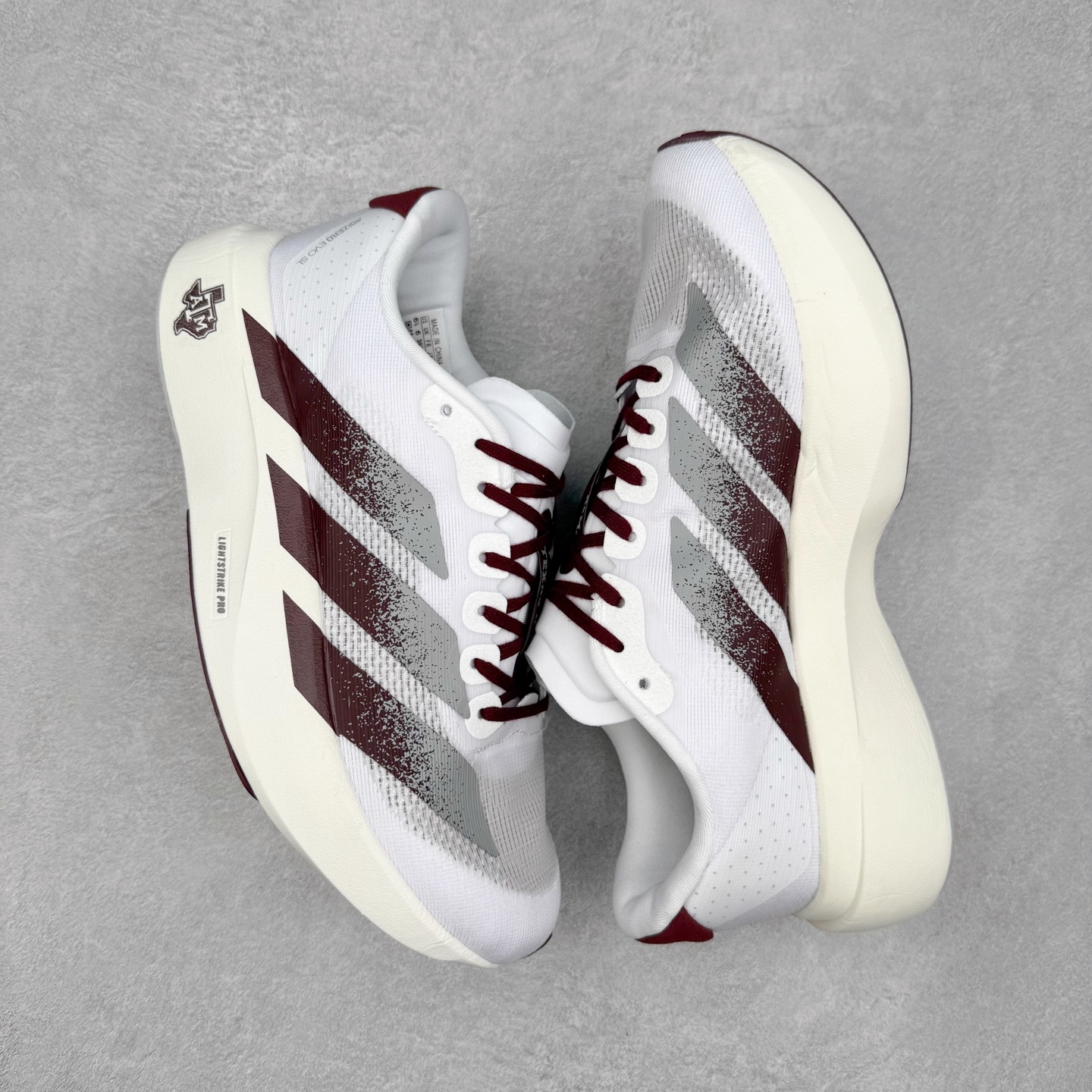 图片[3]-AD Adizero EVO SL 马拉松竞速专业跑鞋 JQ4566 CELERMESH针织网面非常轻薄 纤维间的缝隙很大 可以保证跑步时的透气、排汗效果 鞋舌直接与两侧的内衬和鞋底连接在一起 在跑步过程中不会被鞋舌的左右移动所困扰 在标准鞋带孔的基础上再拓宽一组鞋带孔 适合不同脚型的需求 突破性 EnergyRods 技术，有助于跑者实现更好的成绩 中底独特的LIGHTSTRIKE PRO泡棉材质 微弹感觉在跑步过程中给予了良好的支撑体验 对于顶级精英和高水平进阶跑者来说 ADIOS PRO是一双值得信赖的竞速比赛用鞋 尺码：36 36.5 37.5 38 38.5 39 40 40.5 41 42 42.5 43 44 44.5 45-选品中心