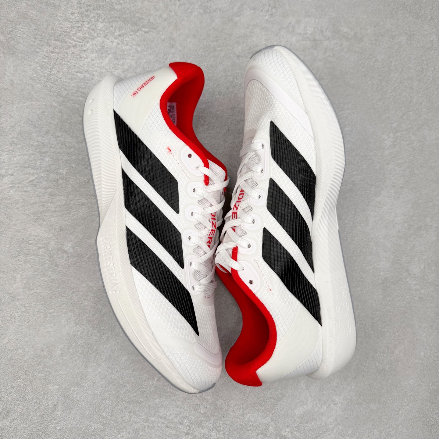 图片[3]-AD Adizero BK 夏季透气网眼竞速跑鞋 JP6529 融合Lightstrike和Lightstrike Pro技术 采用乙烯/乙酸乙烯酯(EVA)材质 打造舒适中底 含ENERGYROD能量碳柱 旨在为步伐添活力 尺码：36 36.5 37 38 38.5 39 40 40.5 41 42 42.5 43 44 44.5 45-选品中心