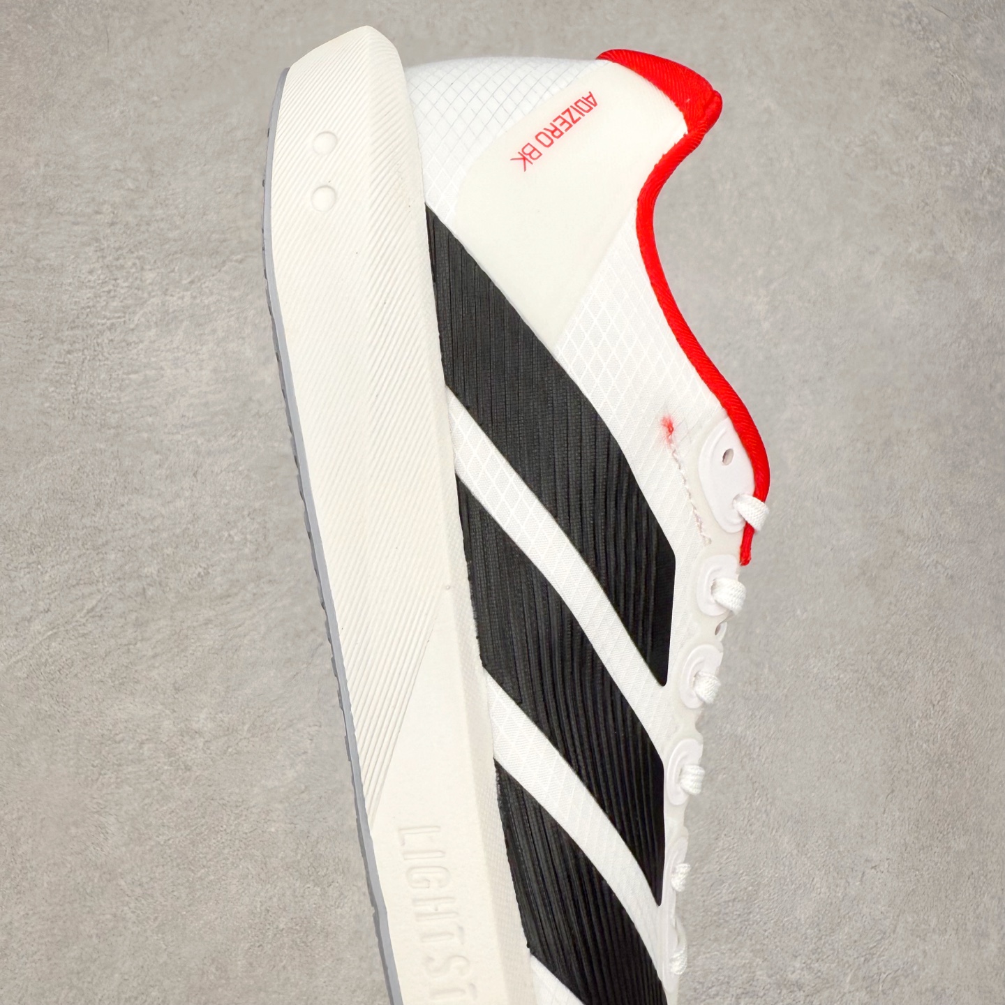 图片[6]-AD Adizero BK 夏季透气网眼竞速跑鞋 JP6529 融合Lightstrike和Lightstrike Pro技术 采用乙烯/乙酸乙烯酯(EVA)材质 打造舒适中底 含ENERGYROD能量碳柱 旨在为步伐添活力 尺码：36 36.5 37 38 38.5 39 40 40.5 41 42 42.5 43 44 44.5 45-选品中心