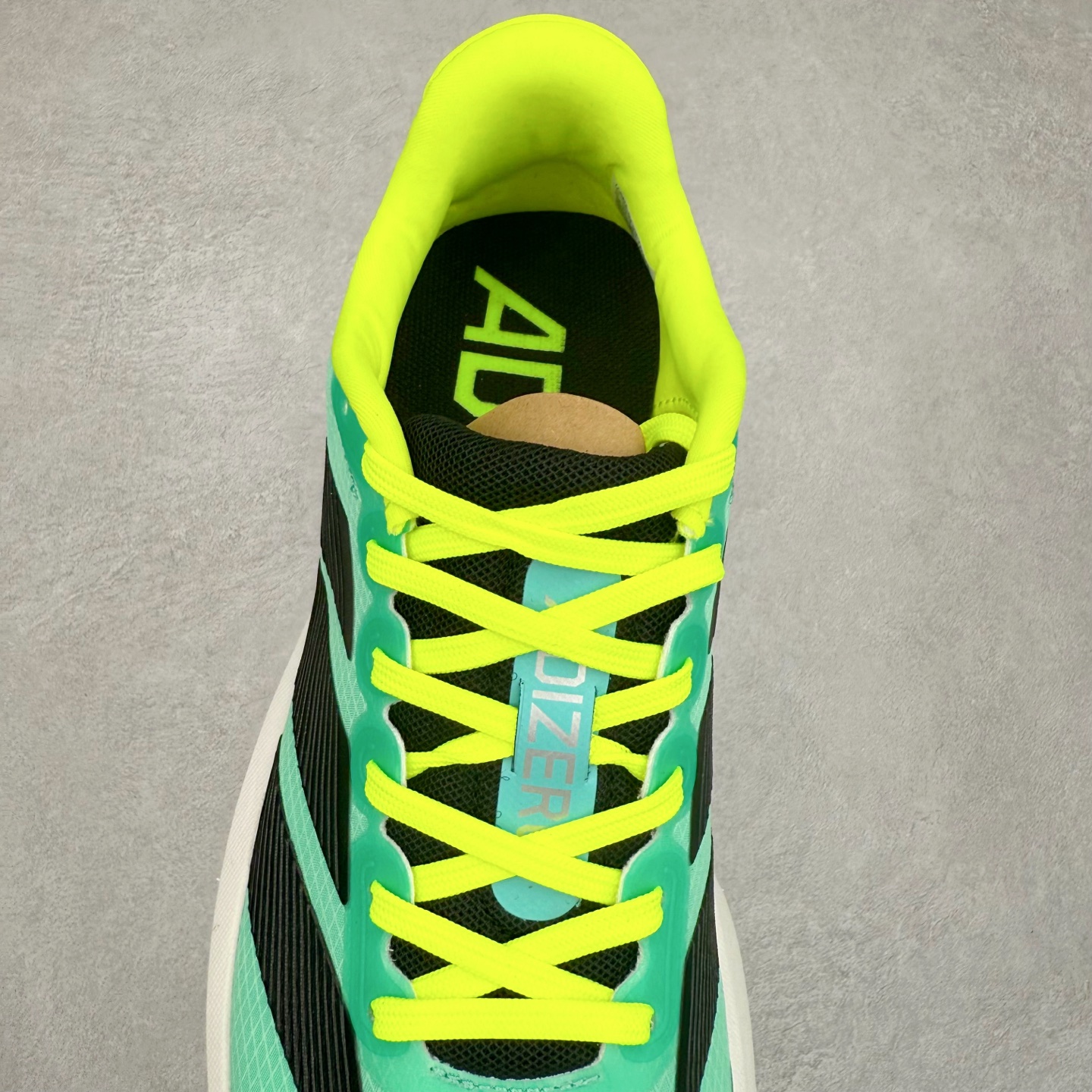 图片[5]-AD Adizero BK 夏季透气网眼竞速跑鞋 JP6543 融合Lightstrike和Lightstrike Pro技术 采用乙烯/乙酸乙烯酯(EVA)材质 打造舒适中底 含ENERGYROD能量碳柱 旨在为步伐添活力 尺码：36 36.5 37 38 38.5 39 40 40.5 41 42 42.5 43 44 44.5 45-选品中心