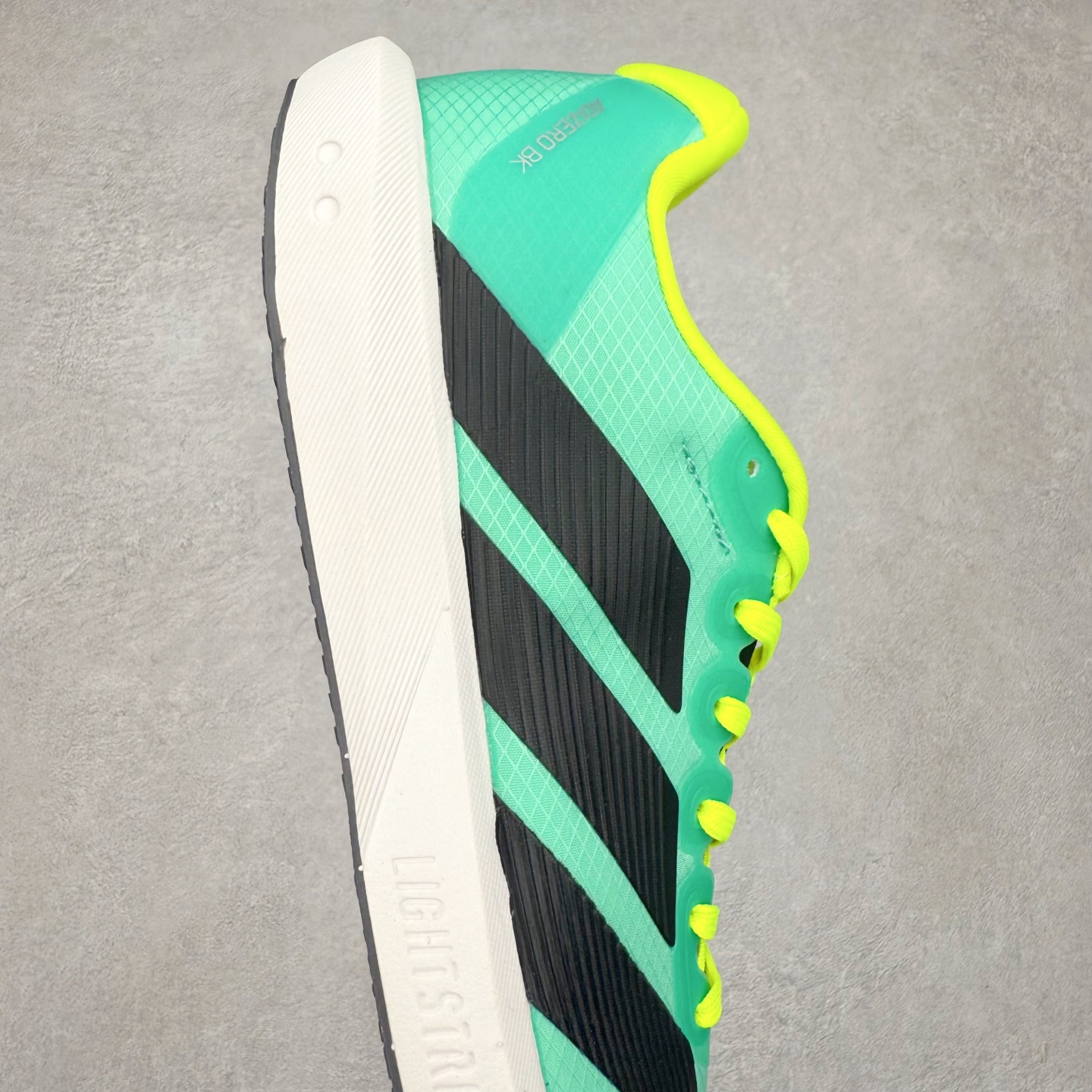 图片[6]-AD Adizero BK 夏季透气网眼竞速跑鞋 JP6543 融合Lightstrike和Lightstrike Pro技术 采用乙烯/乙酸乙烯酯(EVA)材质 打造舒适中底 含ENERGYROD能量碳柱 旨在为步伐添活力 尺码：36 36.5 37 38 38.5 39 40 40.5 41 42 42.5 43 44 44.5 45-选品中心