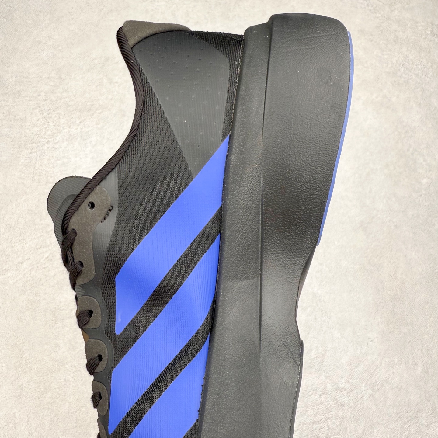 图片[7]-AD Adizero EVO SL 马拉松竞速专业跑鞋 JR5836 CELERMESH针织网面非常轻薄 纤维间的缝隙很大 可以保证跑步时的透气、排汗效果 鞋舌直接与两侧的内衬和鞋底连接在一起 在跑步过程中不会被鞋舌的左右移动所困扰 在标准鞋带孔的基础上再拓宽一组鞋带孔 适合不同脚型的需求 突破性 EnergyRods 技术，有助于跑者实现更好的成绩 中底独特的LIGHTSTRIKE PRO泡棉材质 微弹感觉在跑步过程中给予了良好的支撑体验 对于顶级精英和高水平进阶跑者来说 ADIOS PRO是一双值得信赖的竞速比赛用鞋 尺码：36 36.5 37.5 38 38.5 39 40 40.5 41 42 42.5 43 44 44.5 45-选品中心