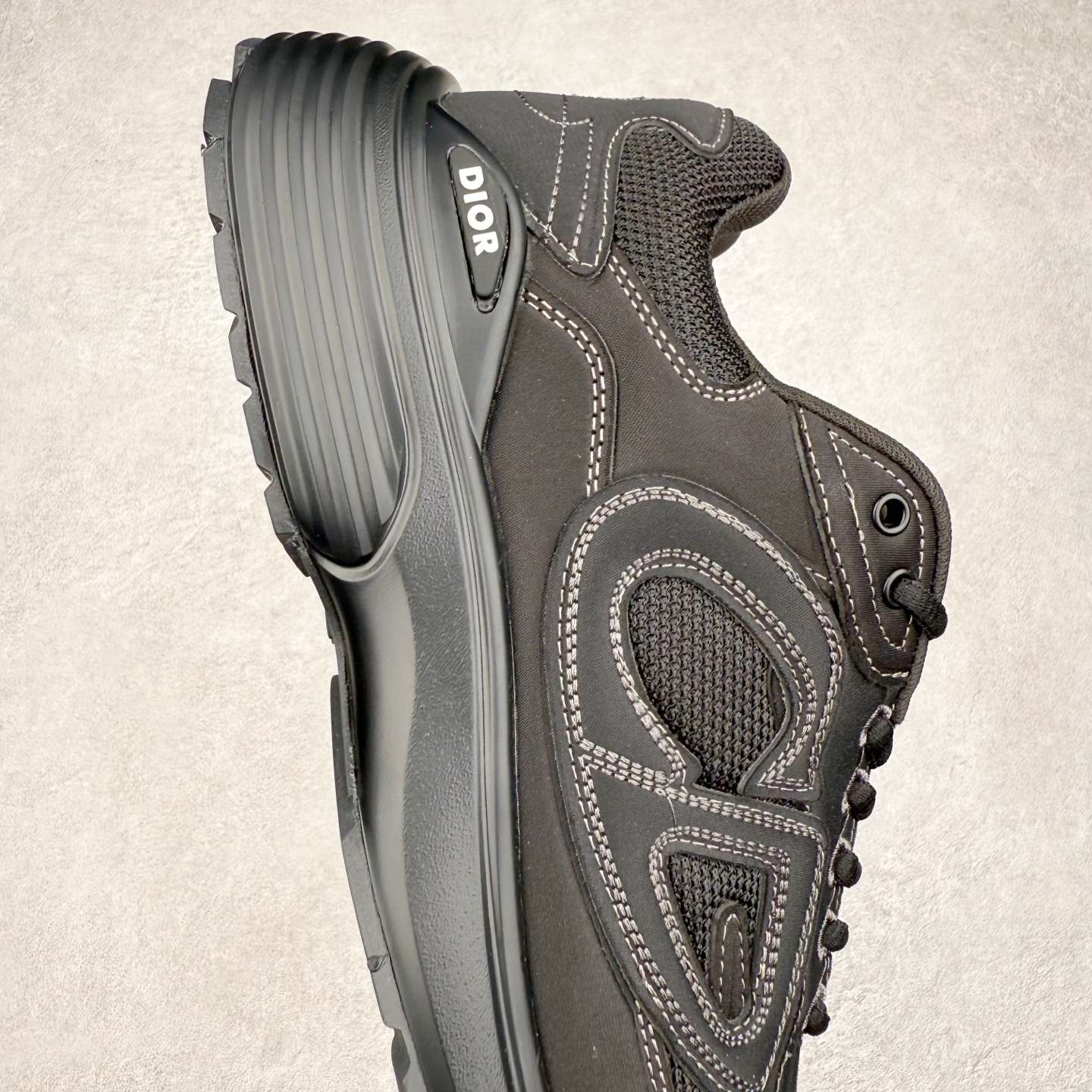 图片[6]-＃纯原福利 Dior x Stone Island 迪奥石头岛联名款B30系列休闲运动鞋老爹鞋 这次精彩的合作堪称一场别开生面的对话，展现了非凡的创意。金•琼斯 （KIM JONES）倾情呈献 DIOR AND STONEISLAND 限定系列，经典罗盘玫瑰与 DIOR 徽标相互融合 该款系列采用黑网色眼织物白和色科技料面精心制作，作饰以反光“CD30”图形标志，外格轻盈的刻雕效果橡胶鞋搭底配标志性点的缀提升格调，内弹部力细节塑造想理的舒适穿着体验可与各休式闲造型配搭，彰显尚时现代的运风动范 尺码：38 39 40 41 42 43 44 45 46 47-选品中心