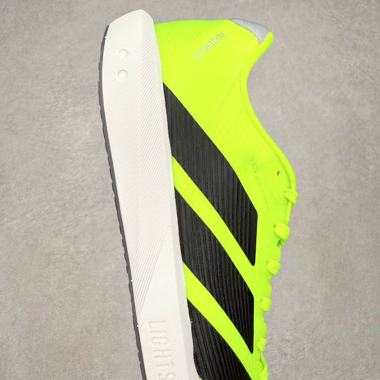 图片[6]-AD Adizero BK 夏季透气网眼竞速跑鞋 JP6533 融合Lightstrike和Lightstrike Pro技术 采用乙烯/乙酸乙烯酯(EVA)材质 打造舒适中底 含ENERGYROD能量碳柱 旨在为步伐添活力 尺码：36 36.5 37 38 38.5 39 40 40.5 41 42 42.5 43 44 44.5 45-选品中心