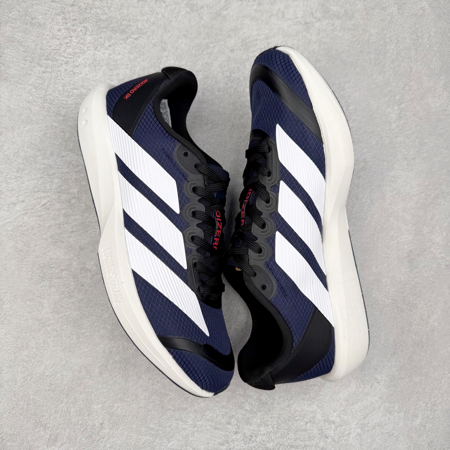 图片[3]-AD Adizero BK 夏季透气网眼竞速跑鞋 JP6515 融合Lightstrike和Lightstrike Pro技术 采用乙烯/乙酸乙烯酯(EVA)材质 打造舒适中底 含ENERGYROD能量碳柱 旨在为步伐添活力 尺码：36 36.5 37 38 38.5 39 40 40.5 41 42 42.5 43 44 44.5 45-选品中心