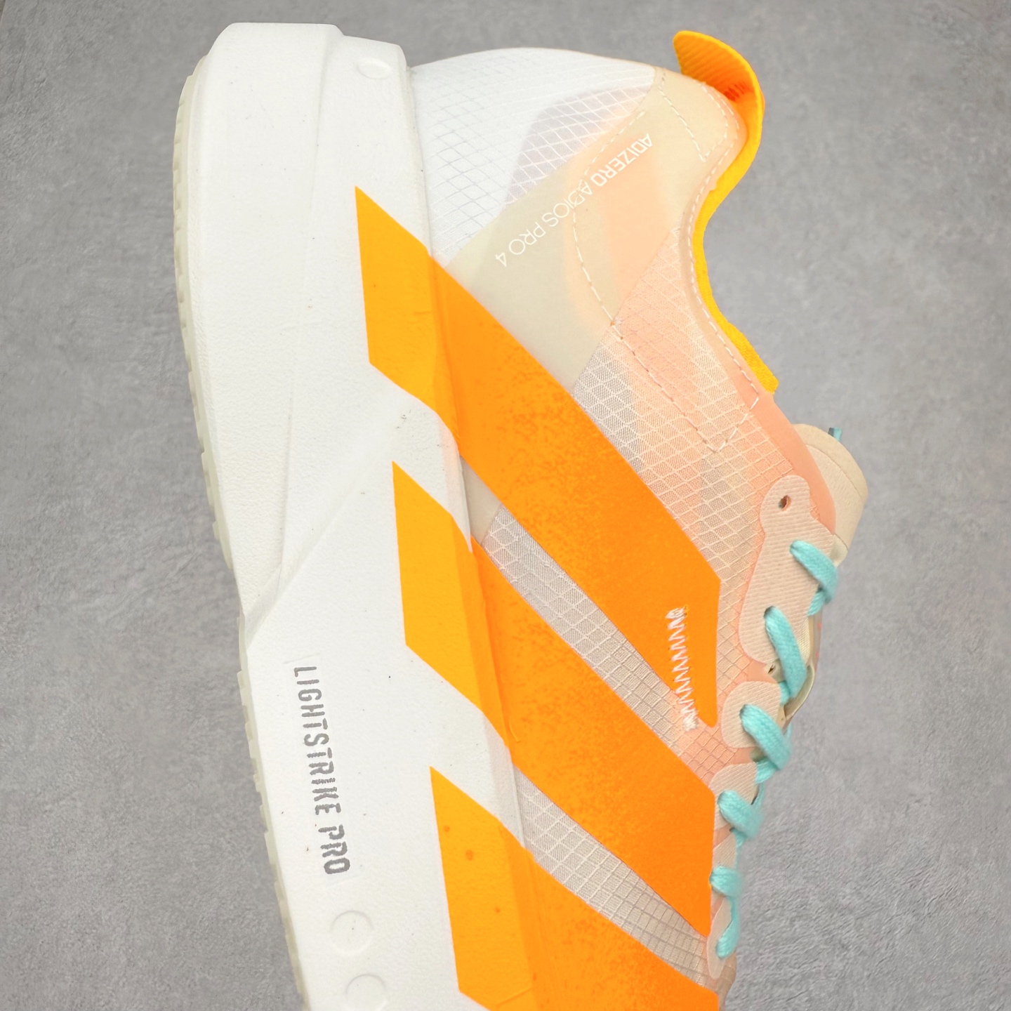 图片[6]-AD Adizero Adios Pro 4 马拉松竞速专业跑鞋 JR1241 CELERMESH针织网面非常轻薄 纤维间的缝隙很大 可以保证跑步时的透气、排汗效果 鞋舌直接与两侧的内衬和鞋底连接在一起 在跑步过程中不会被鞋舌的左右移动所困扰 在标准鞋带孔的基础上再拓宽一组鞋带孔 适合不同脚型的需求 突破性 EnergyRods 技术，有助于跑者实现更好的成绩 中底独特的LIGHTSTRIKE PRO泡棉材质 微弹感觉在跑步过程中给予了良好的支撑体验 对于顶级精英和高水平进阶跑者来说 ADIOS PRO是一双值得信赖的竞速比赛用鞋 尺码：36 36.5 37.5 38 38.5 39 40 40.5 41 42 42.5 43 44 44.5 45-选品中心