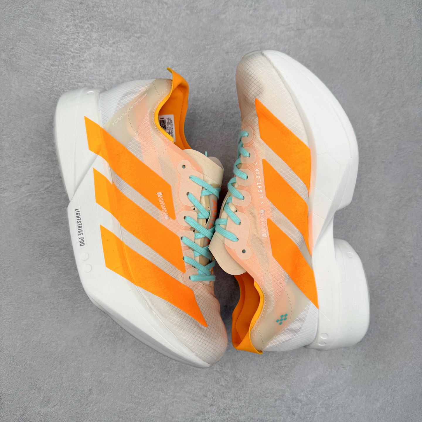 图片[3]-AD Adizero Adios Pro 4 马拉松竞速专业跑鞋 JR1241 CELERMESH针织网面非常轻薄 纤维间的缝隙很大 可以保证跑步时的透气、排汗效果 鞋舌直接与两侧的内衬和鞋底连接在一起 在跑步过程中不会被鞋舌的左右移动所困扰 在标准鞋带孔的基础上再拓宽一组鞋带孔 适合不同脚型的需求 突破性 EnergyRods 技术，有助于跑者实现更好的成绩 中底独特的LIGHTSTRIKE PRO泡棉材质 微弹感觉在跑步过程中给予了良好的支撑体验 对于顶级精英和高水平进阶跑者来说 ADIOS PRO是一双值得信赖的竞速比赛用鞋 尺码：36 36.5 37.5 38 38.5 39 40 40.5 41 42 42.5 43 44 44.5 45-选品中心