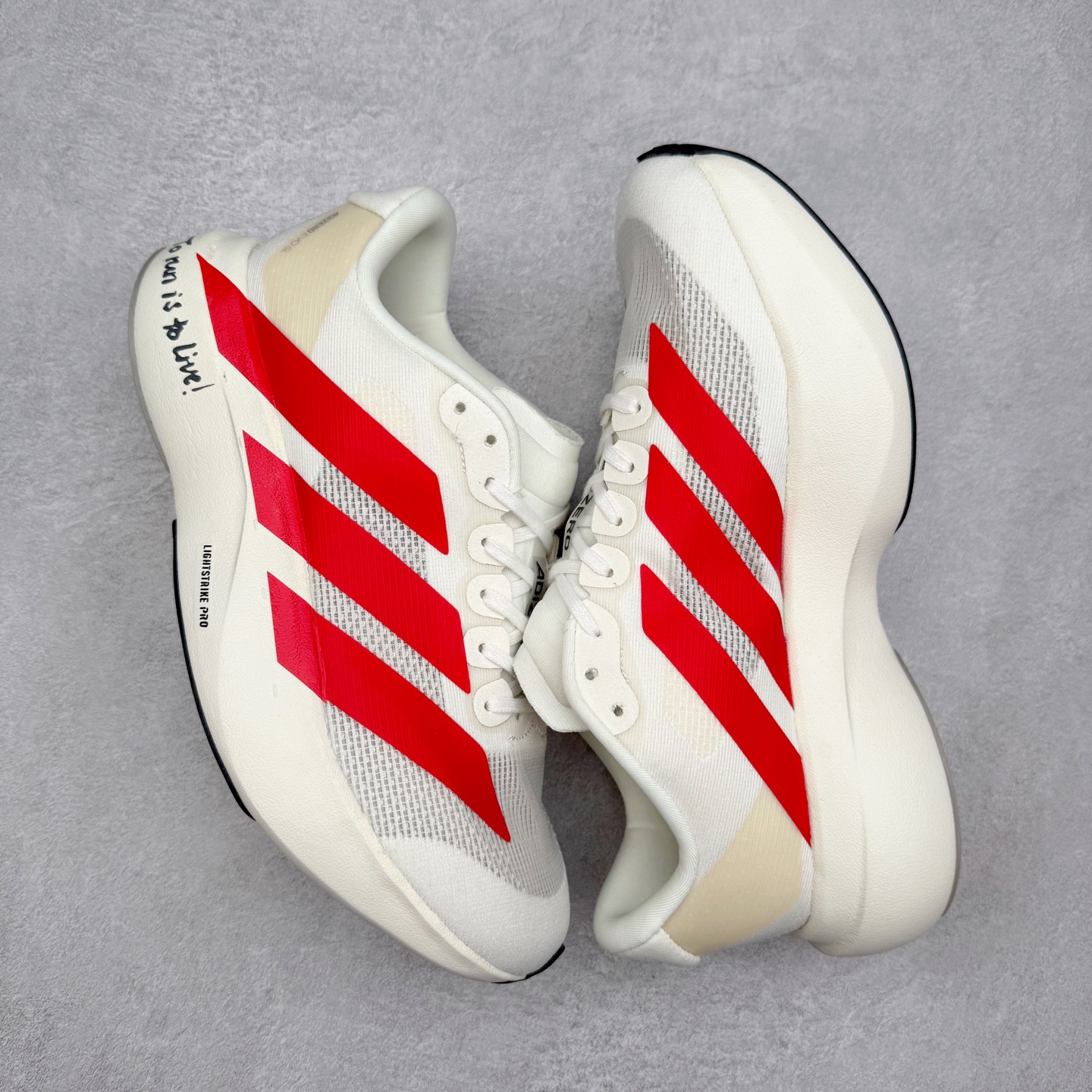 图片[3]-AD Adizero EVO SL 马拉松竞速专业跑鞋 CELERMESH针织网面非常轻薄 纤维间的缝隙很大 可以保证跑步时的透气、排汗效果 鞋舌直接与两侧的内衬和鞋底连接在一起 在跑步过程中不会被鞋舌的左右移动所困扰 在标准鞋带孔的基础上再拓宽一组鞋带孔 适合不同脚型的需求 突破性 EnergyRods 技术，有助于跑者实现更好的成绩 中底独特的LIGHTSTRIKE PRO泡棉材质 微弹感觉在跑步过程中给予了良好的支撑体验 对于顶级精英和高水平进阶跑者来说 ADIOS PRO是一双值得信赖的竞速比赛用鞋 尺码：36 36.5 37.5 38 38.5 39 40 40.5 41 42 42.5 43 44 44.5 45-选品中心