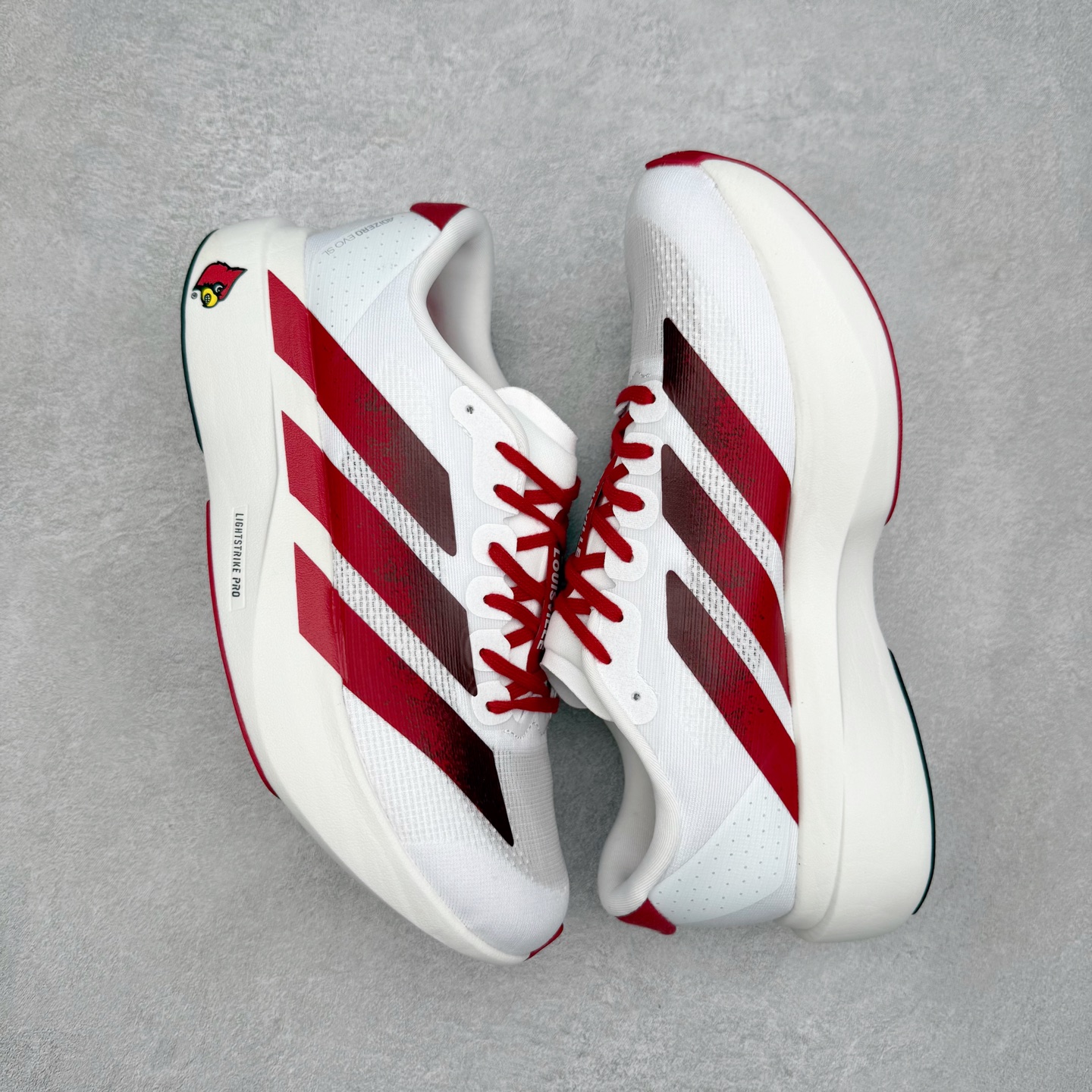 图片[3]-AD Adizero EVO SL 马拉松竞速专业跑鞋 JQ4567 CELERMESH针织网面非常轻薄 纤维间的缝隙很大 可以保证跑步时的透气、排汗效果 鞋舌直接与两侧的内衬和鞋底连接在一起 在跑步过程中不会被鞋舌的左右移动所困扰 在标准鞋带孔的基础上再拓宽一组鞋带孔 适合不同脚型的需求 突破性 EnergyRods 技术，有助于跑者实现更好的成绩 中底独特的LIGHTSTRIKE PRO泡棉材质 微弹感觉在跑步过程中给予了良好的支撑体验 对于顶级精英和高水平进阶跑者来说 ADIOS PRO是一双值得信赖的竞速比赛用鞋 尺码：36 36.5 37.5 38 38.5 39 40 40.5 41 42 42.5 43 44 44.5 45-选品中心